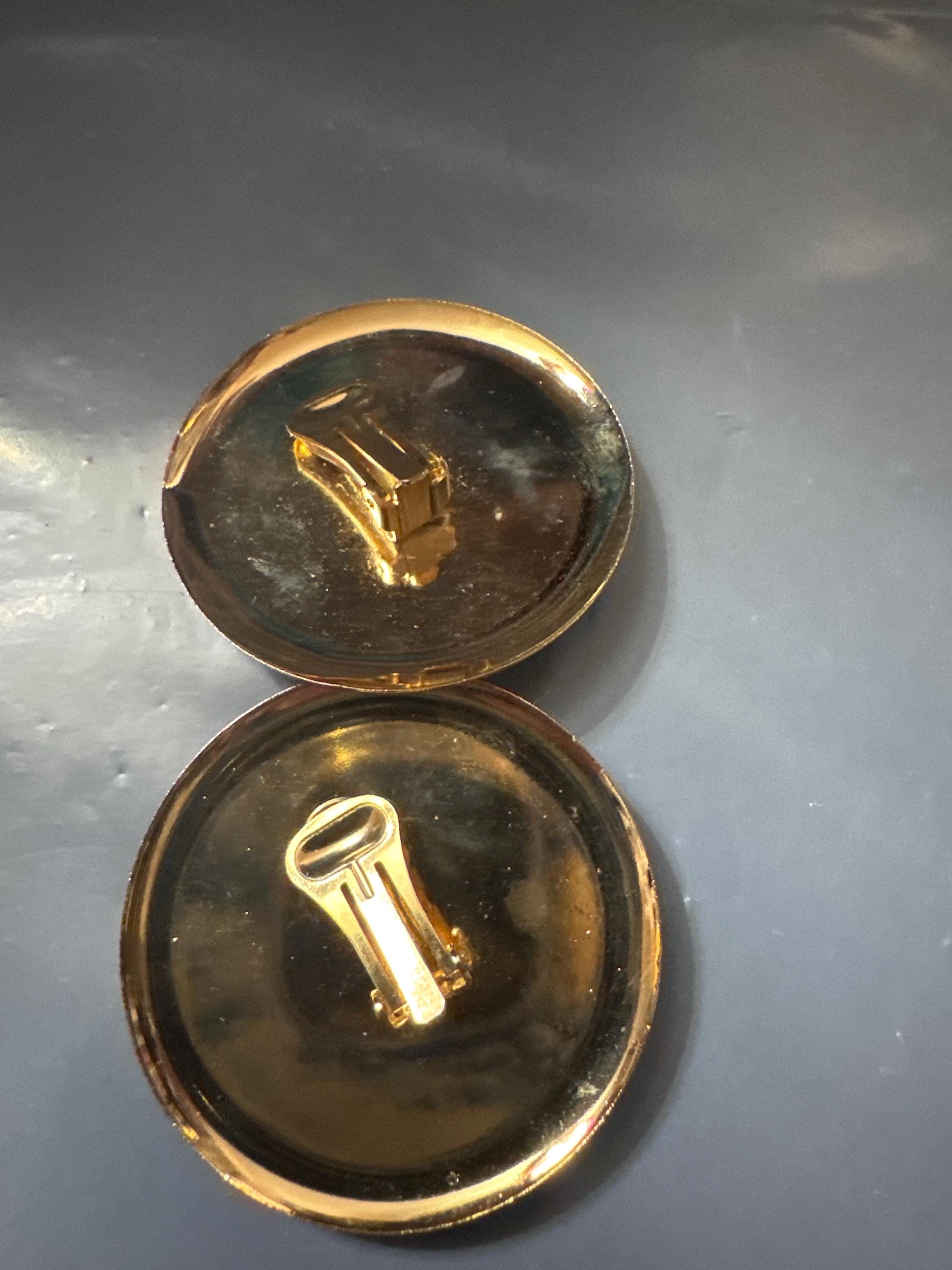 Gold disc clip on earrings, oversized embossed metal 1980s