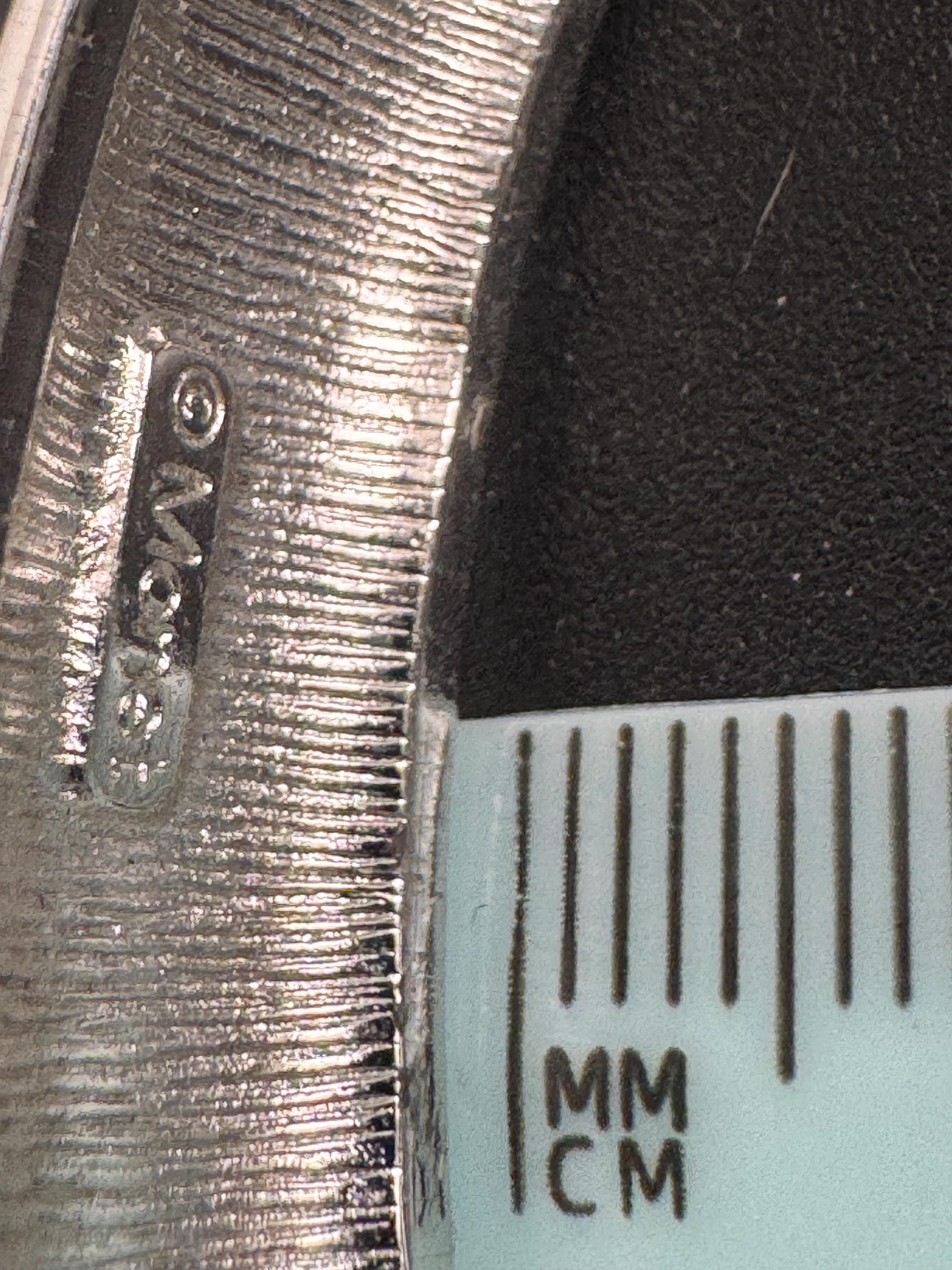 Beige enamel Monet bangle , silver tone clamper and signed