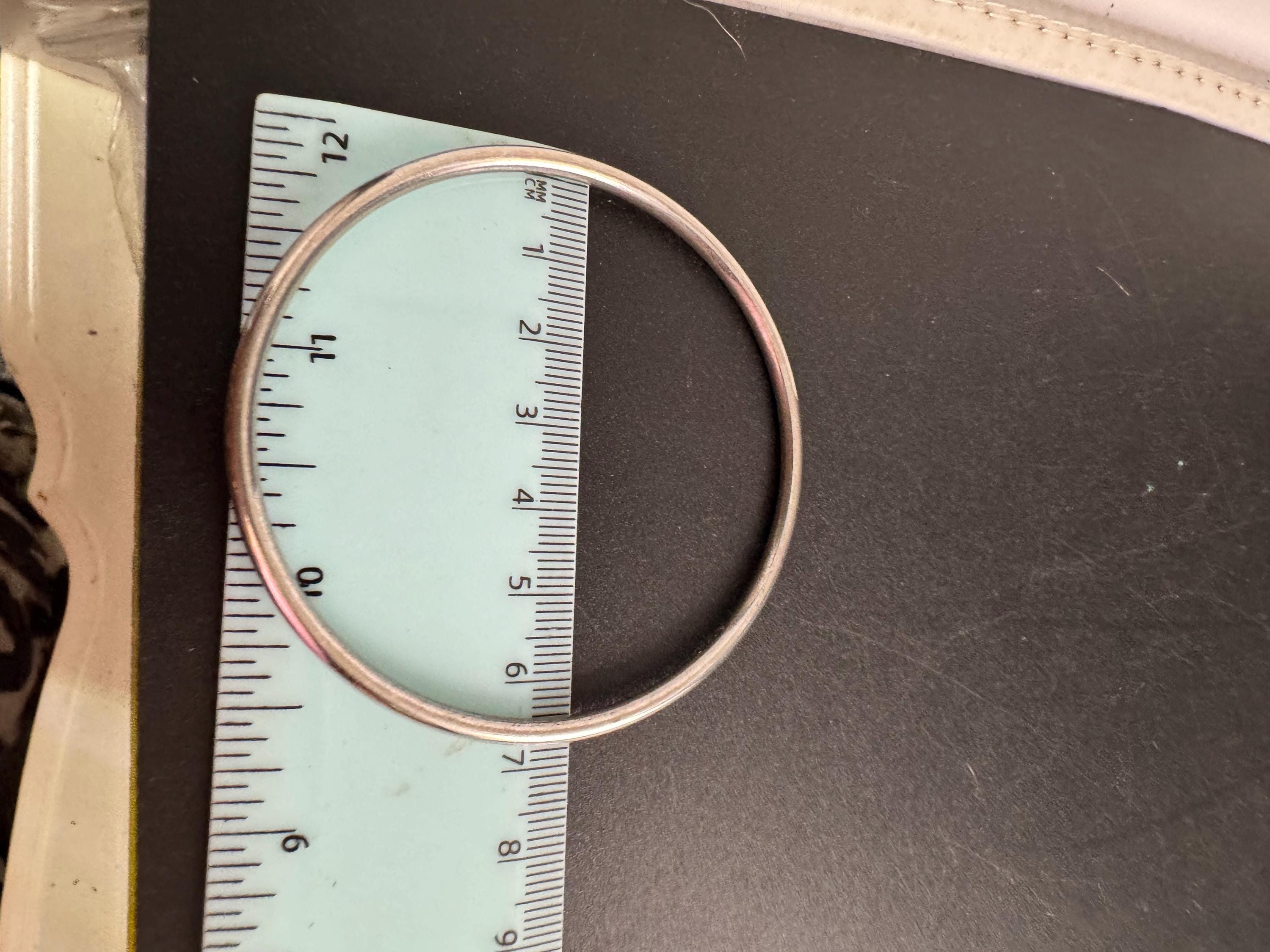 Monet slim stacking bangle , silver tone vintage and signed