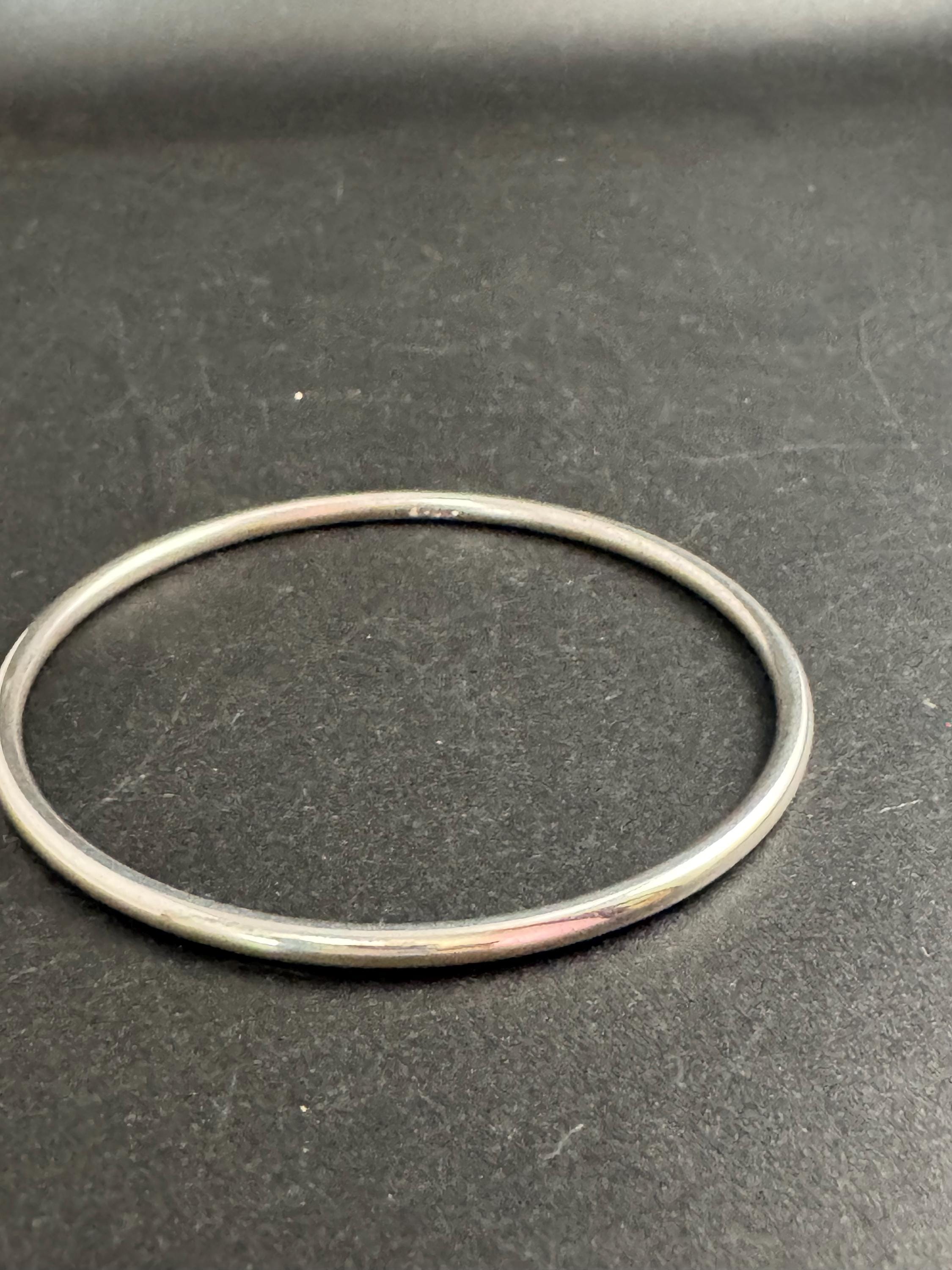 Monet slim stacking bangle , silver tone vintage and signed