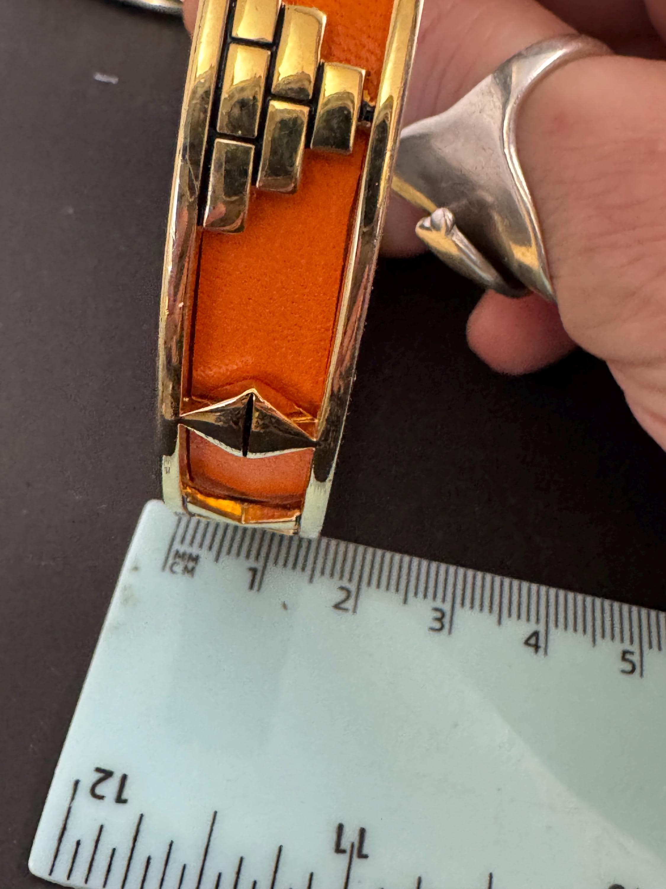 House of Harlow Orange inca bangle, enamelled 1960s gold plated