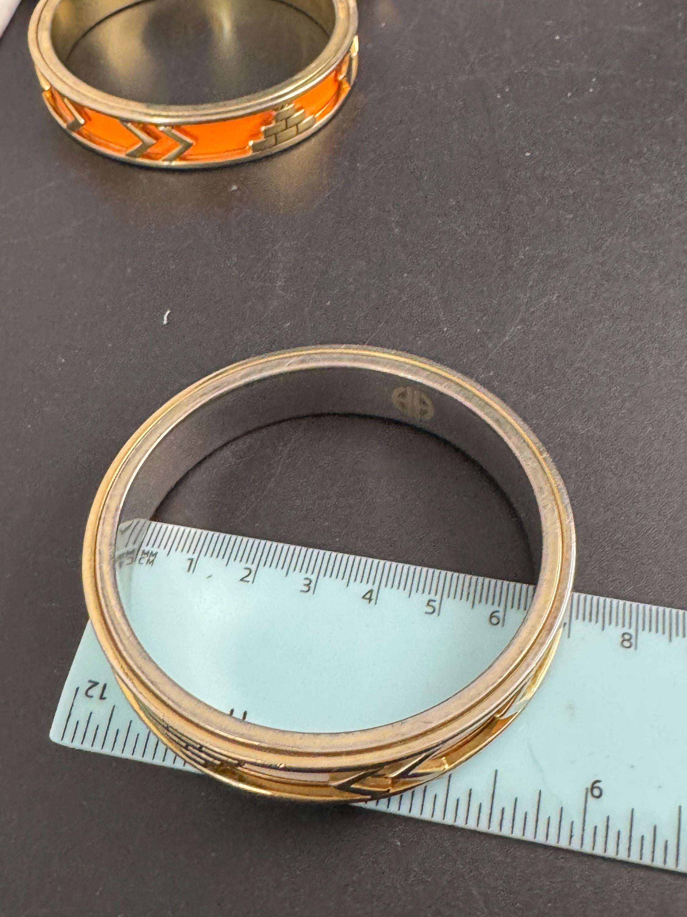 House of Harlow cream inca bangle, enamelled 1960s silver tone and gold plated