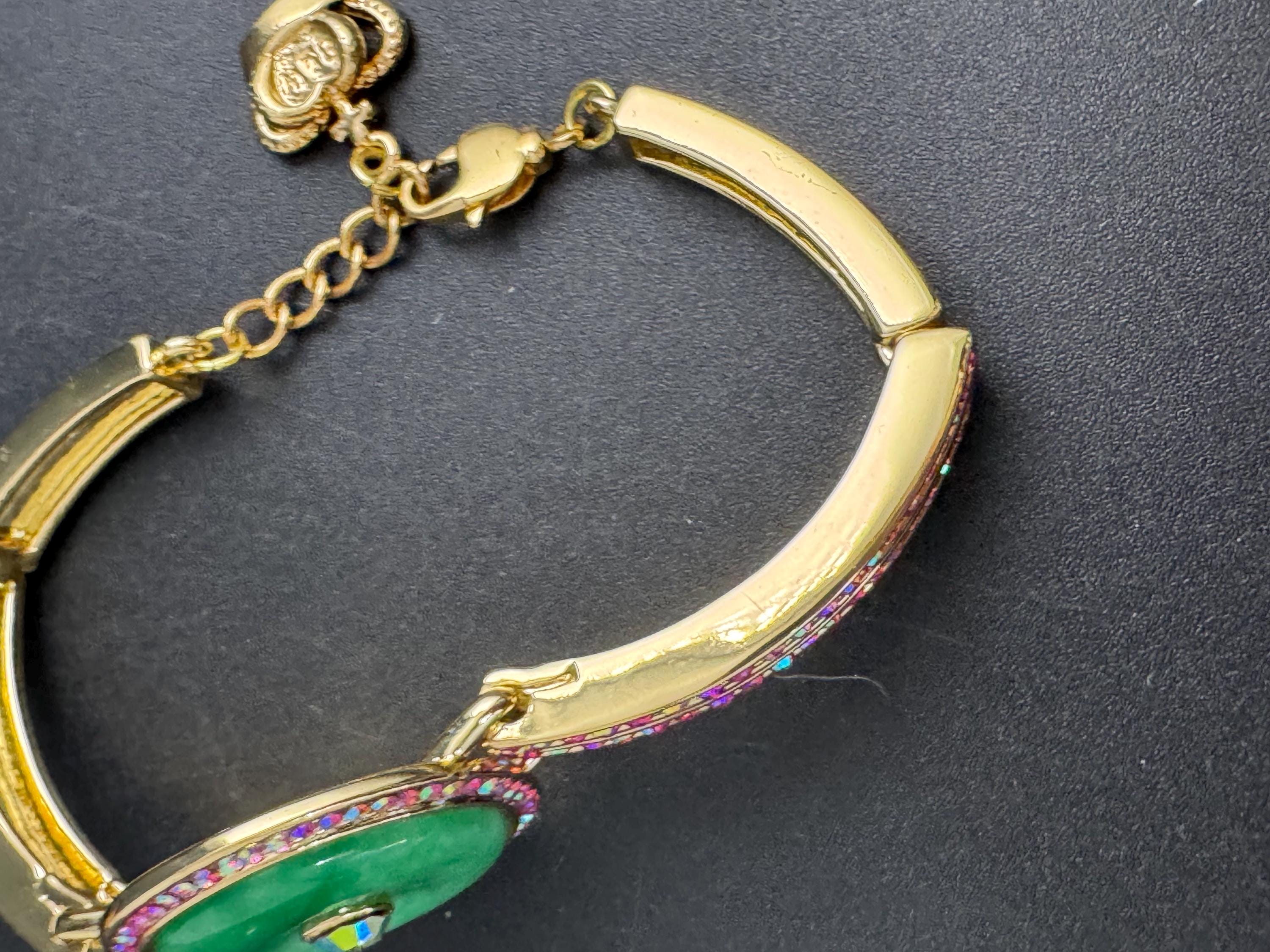 Butler & Wilson pink rhinestone bracelet, ab rhinestone crystals with green peking glass central cabochon