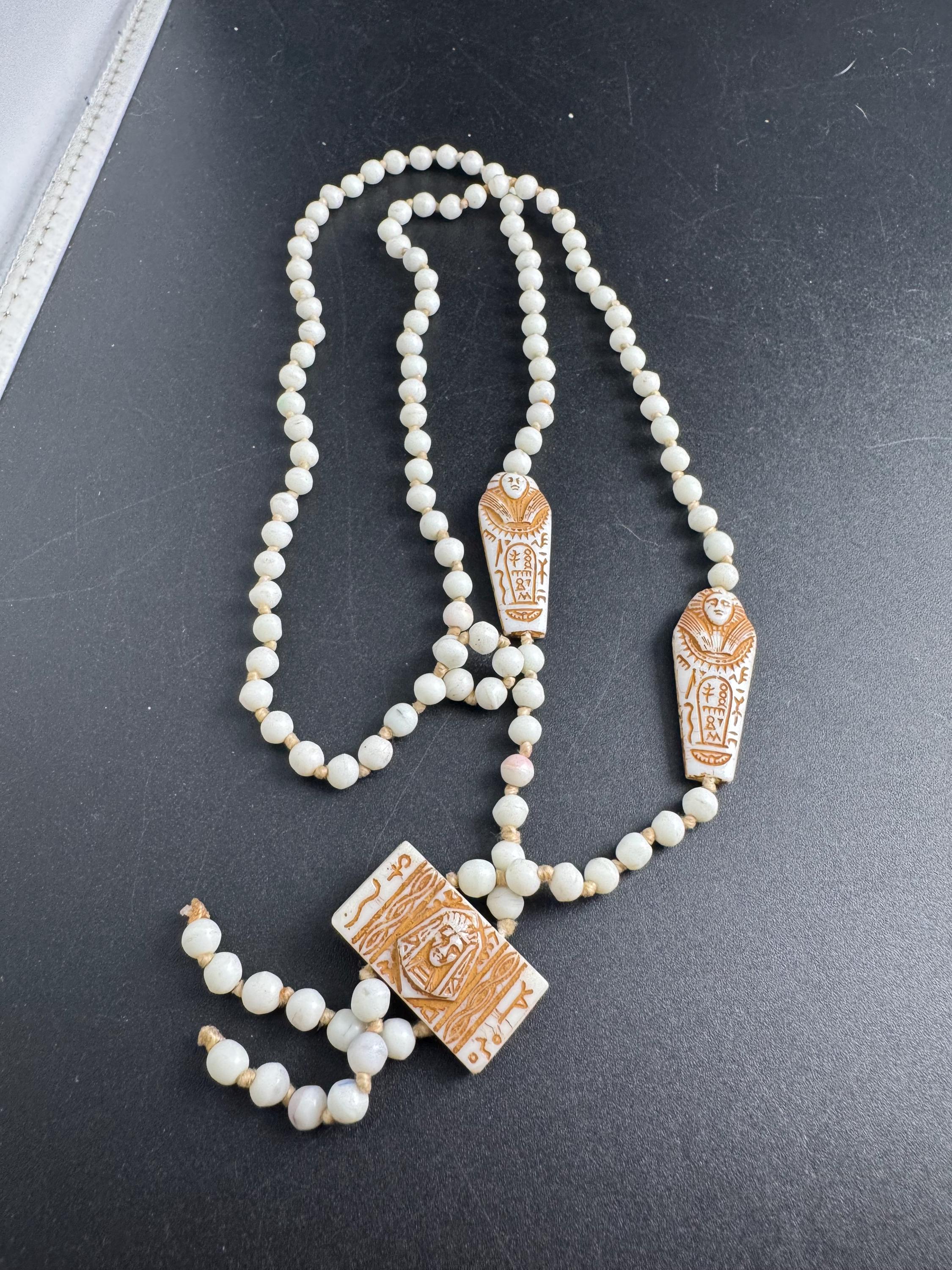 neiger UV coffin necklace, cream beads 84cm uranium glass