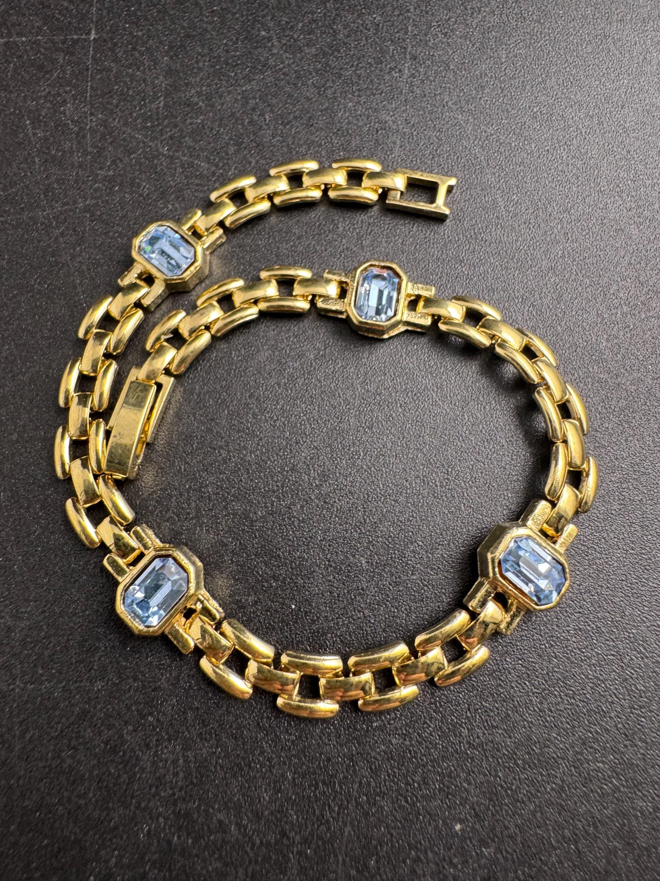 Slim Panther link rhinestone bracelet, light sapphire blue octagon Swarovski crystals gold plated
