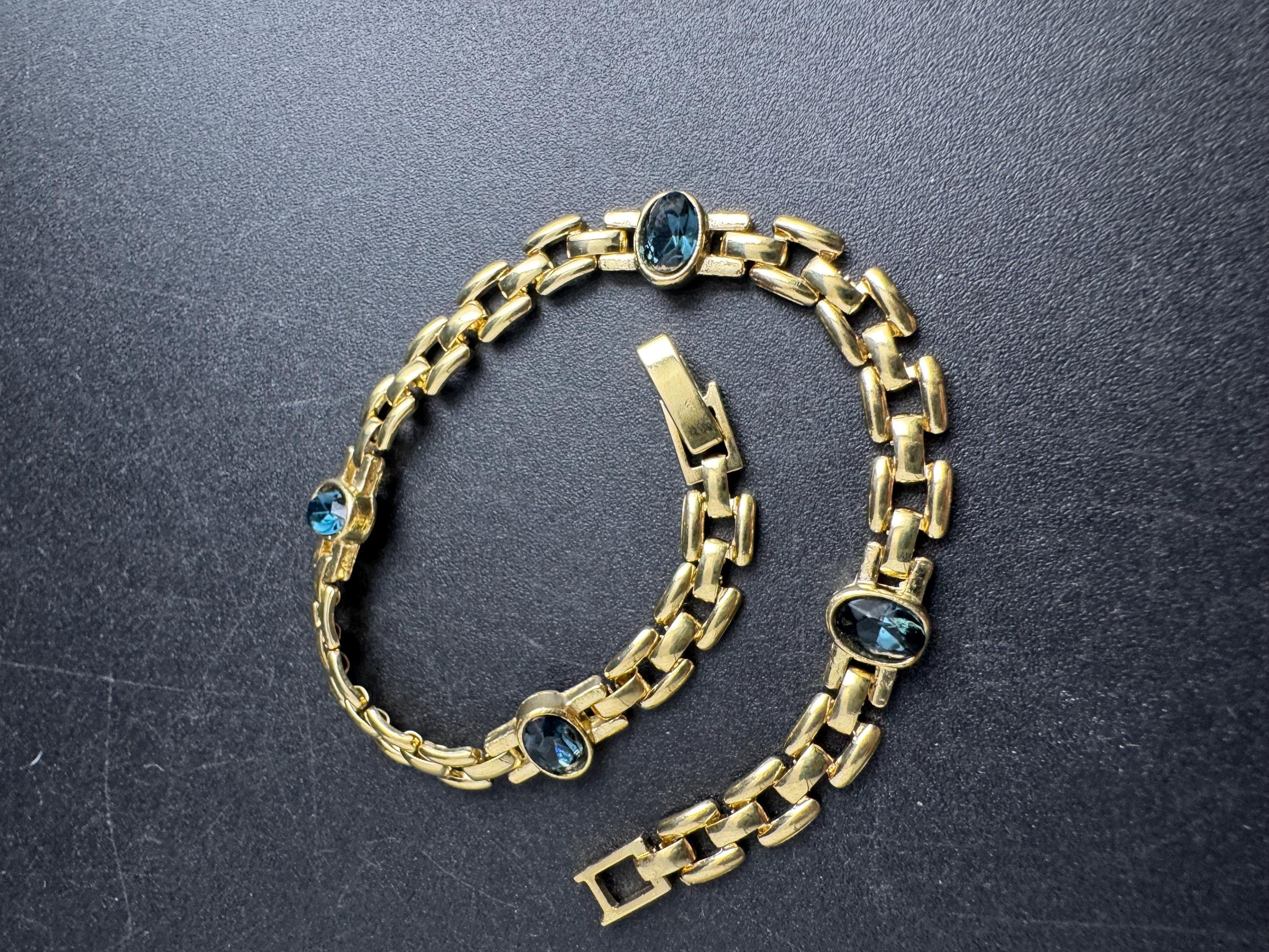 Slim Panther link rhinestone bracelet, dark sapphire blue oval cabochon crystals gold plated