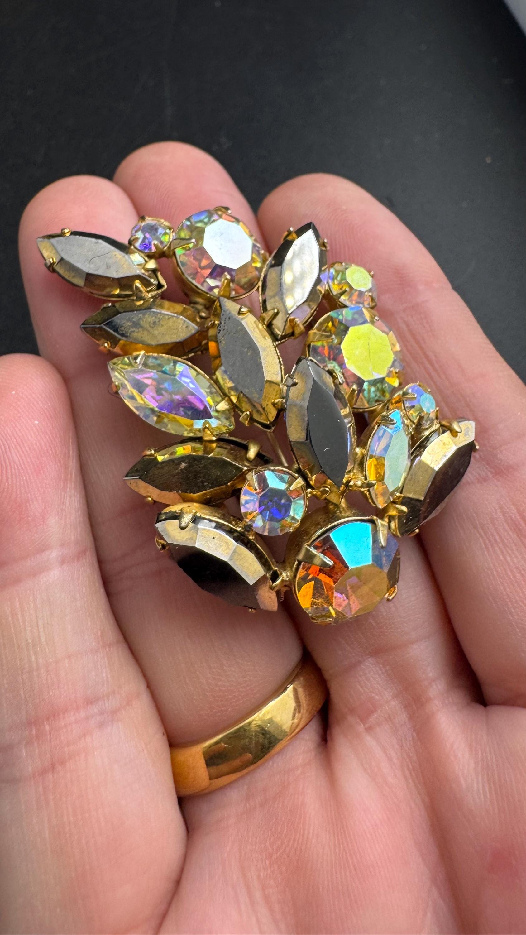 Regency AB rhinestone brooch, Aurora borealis and bronze stones