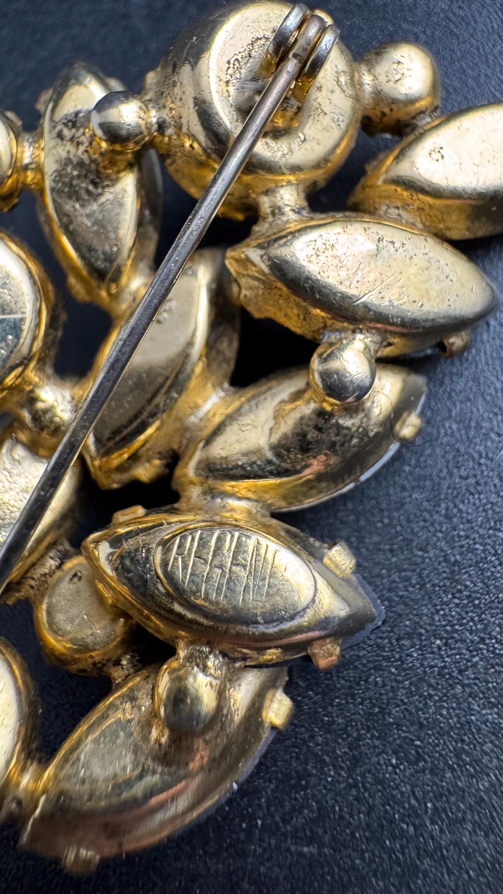 Regency AB rhinestone brooch, Aurora borealis and bronze stones