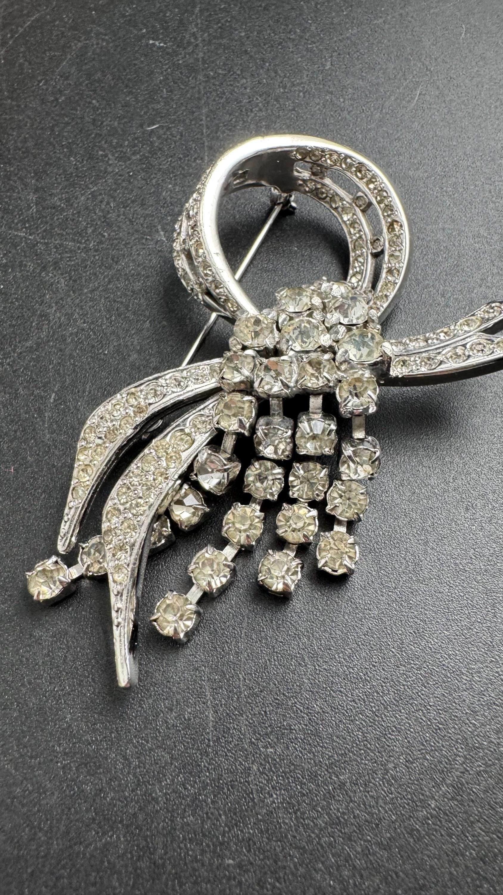 Large clear rhinestone tassel brooch, chrome back vintage quality
