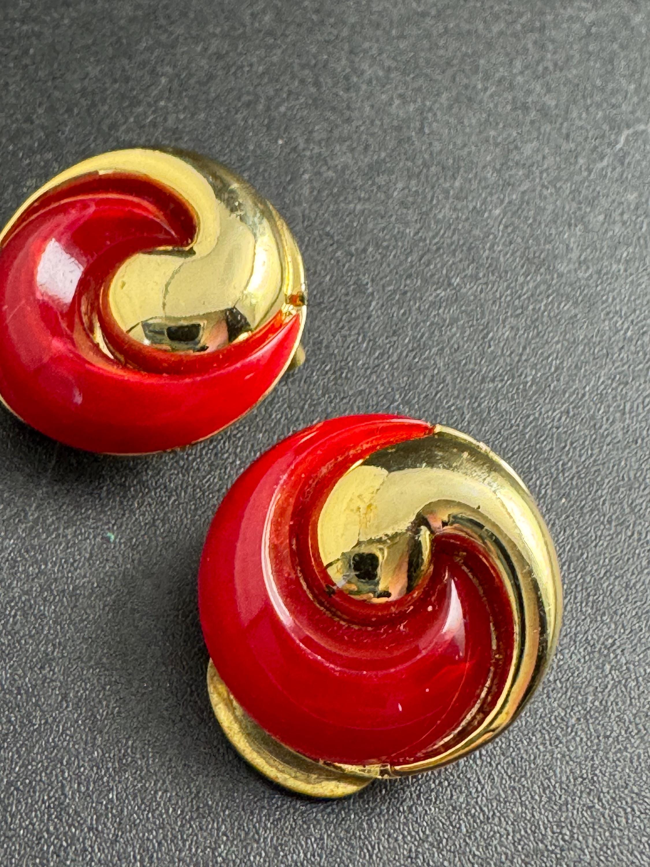 Bright red gold clip on earrings, vintage early plastic swirl