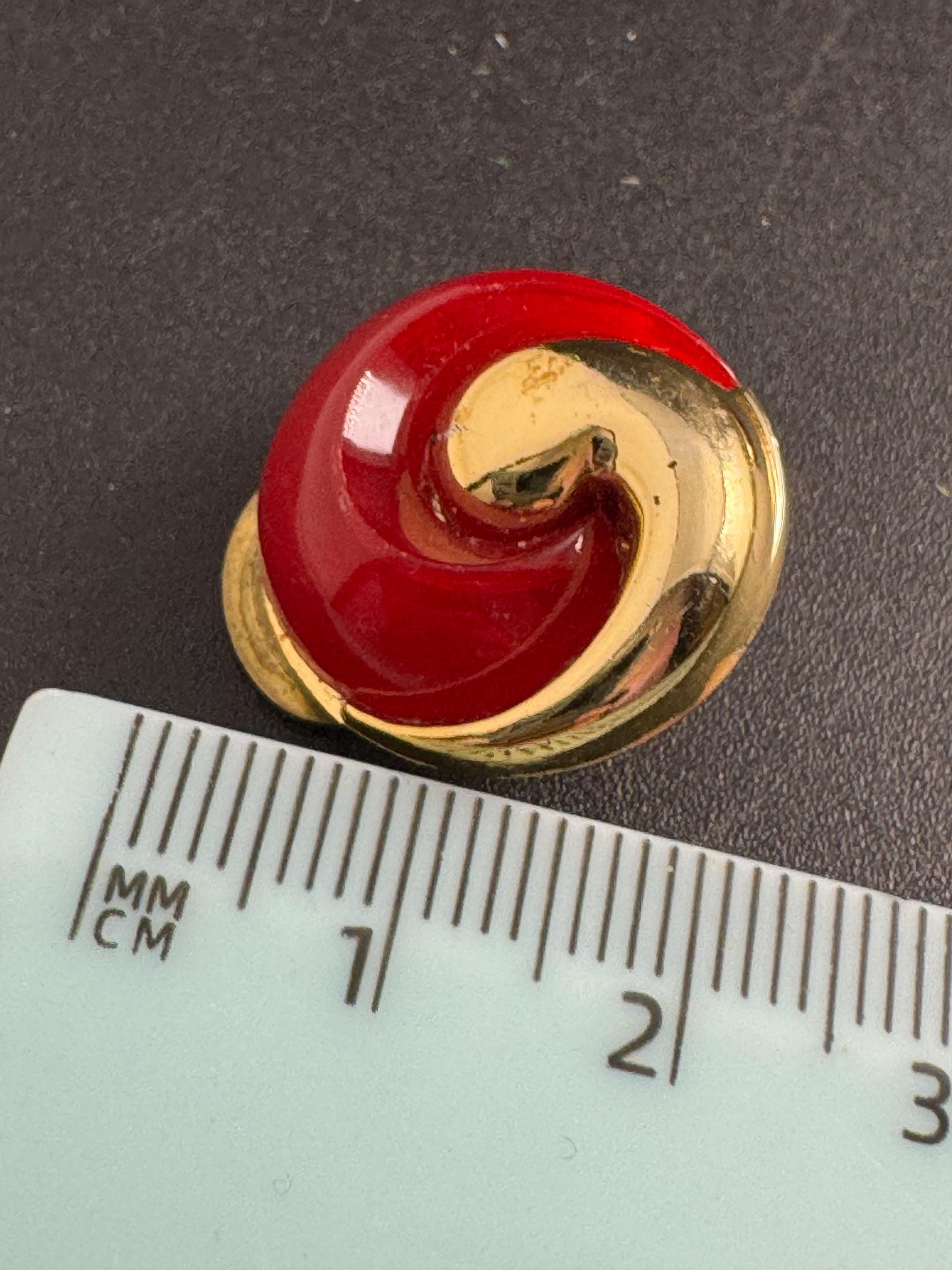 Bright red gold clip on earrings, vintage early plastic swirl
