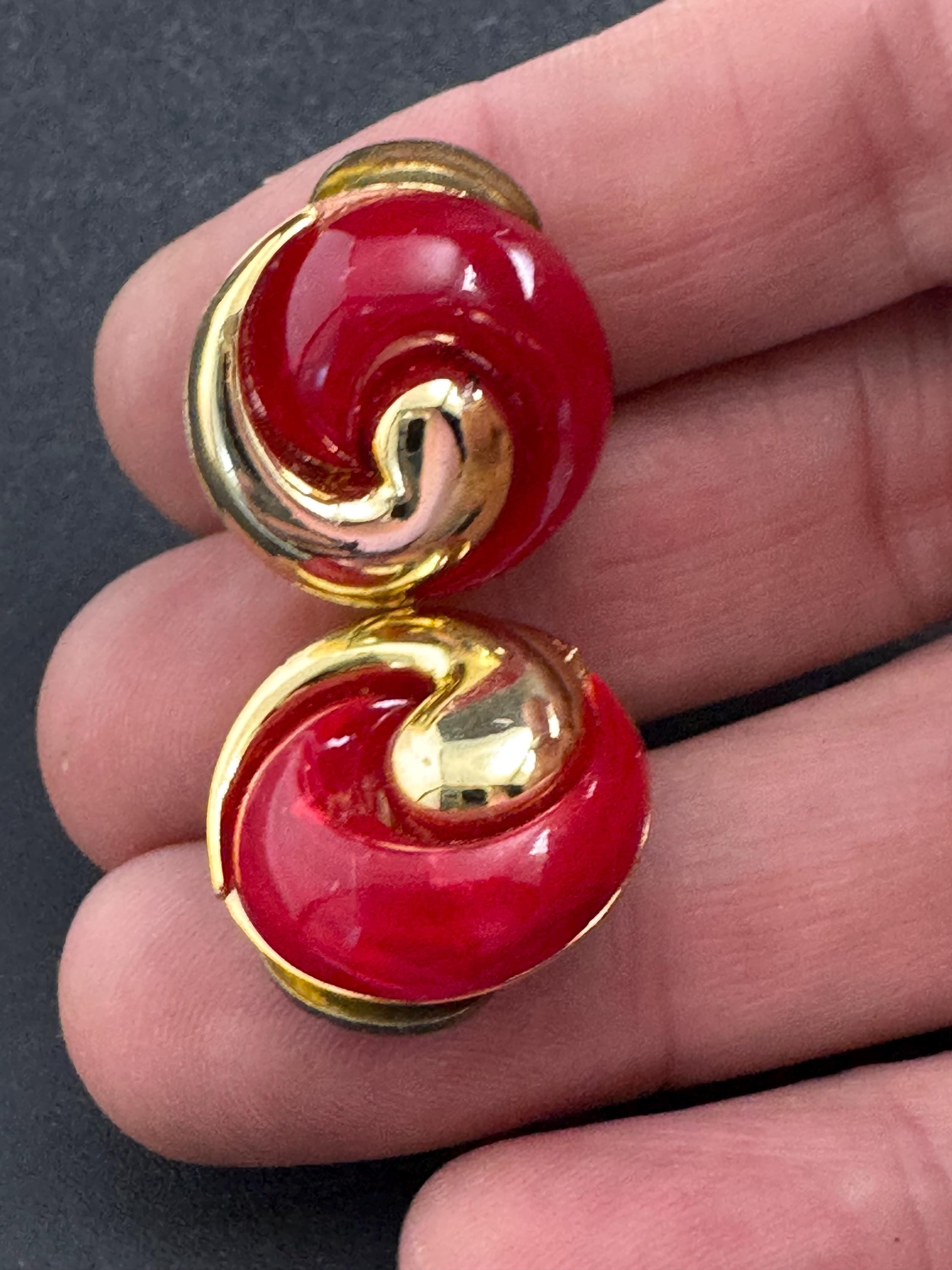 Bright red gold clip on earrings, vintage early plastic swirl