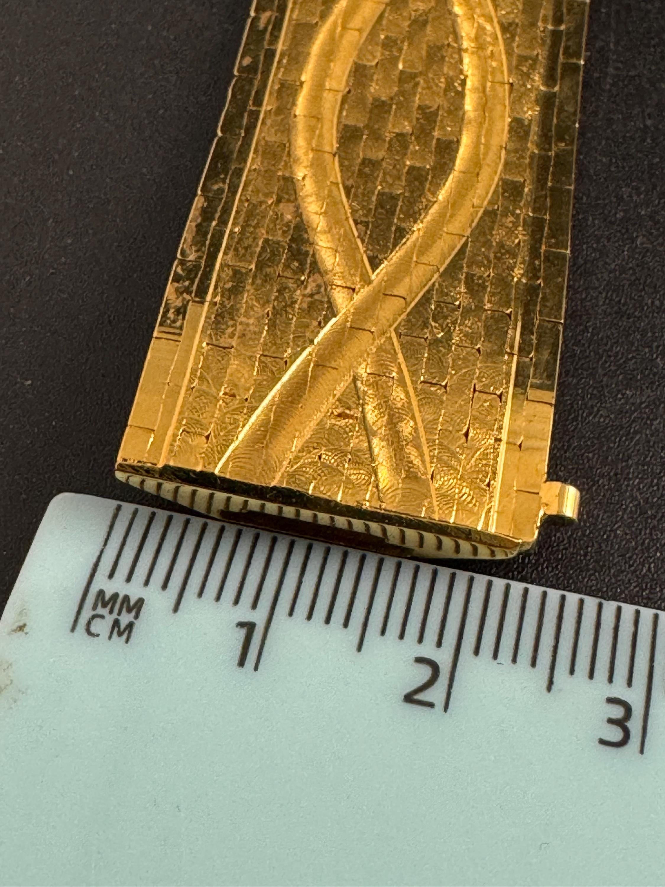 Wide gold plated flat bracelet, articulated 1970s