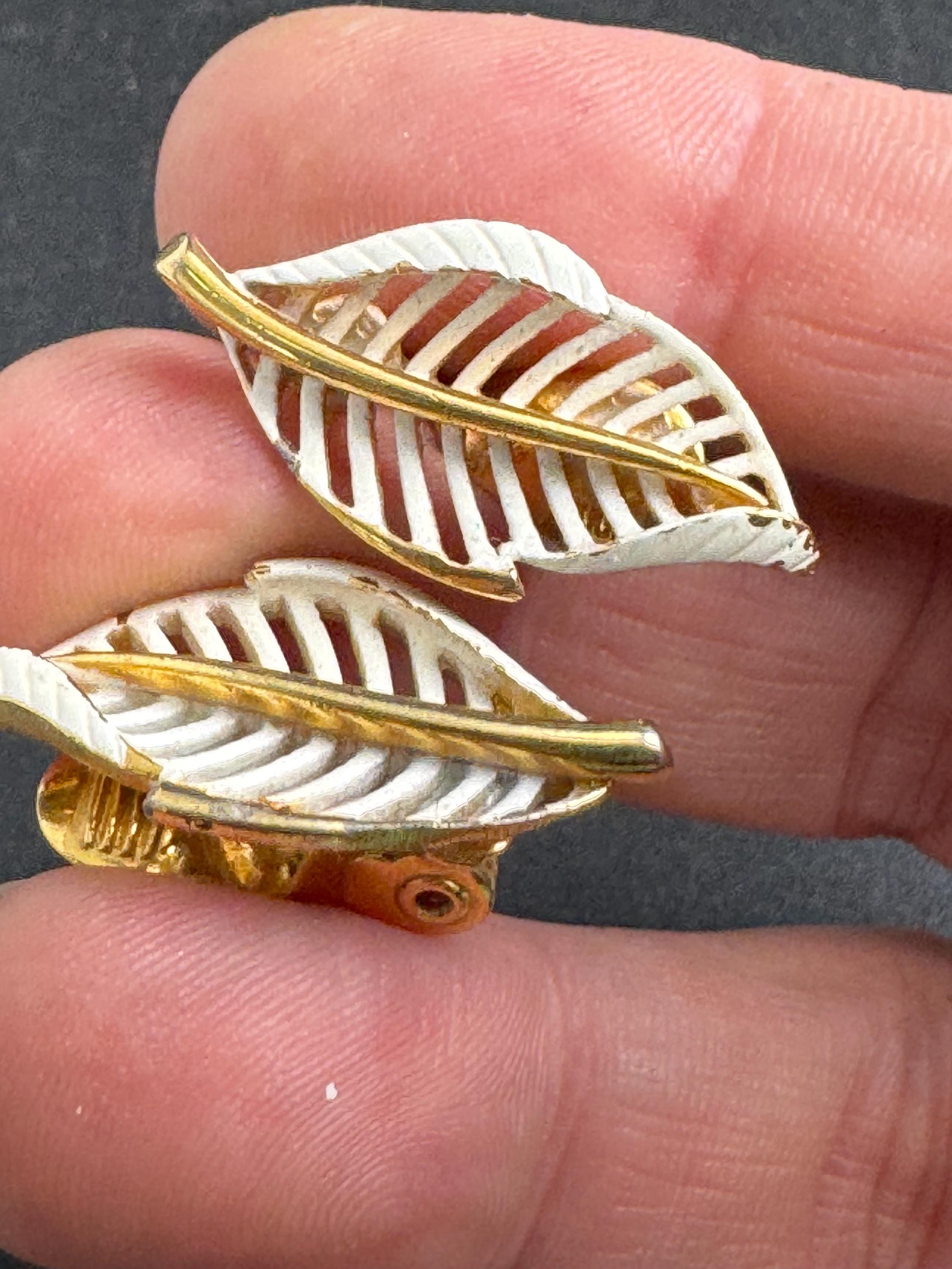 MONET cream white leaf clip on earrings, gold plated enamel and signed vintage