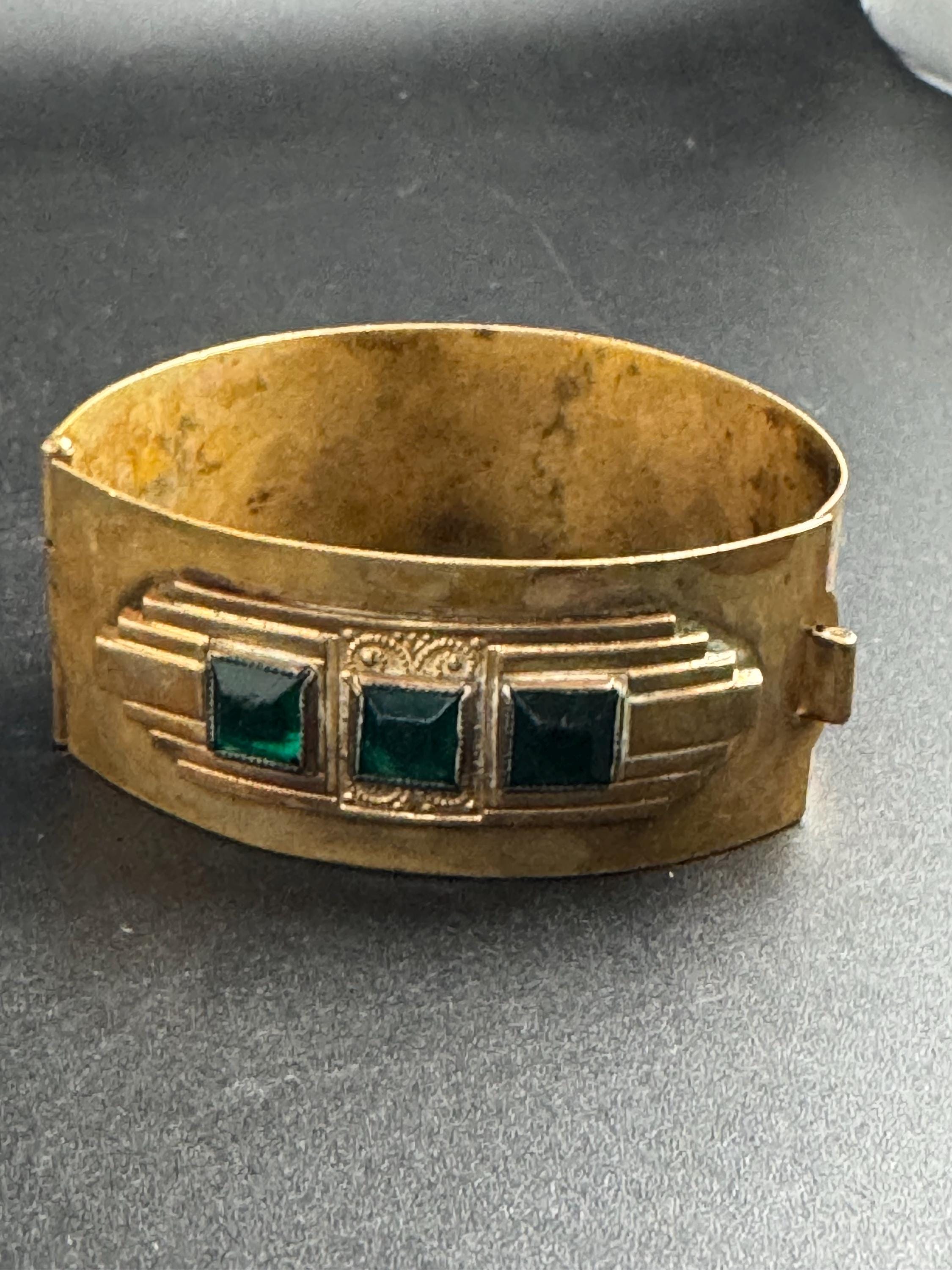 Czech art deco brass clamper Bangle bracelet, set with emerald green rhinestones