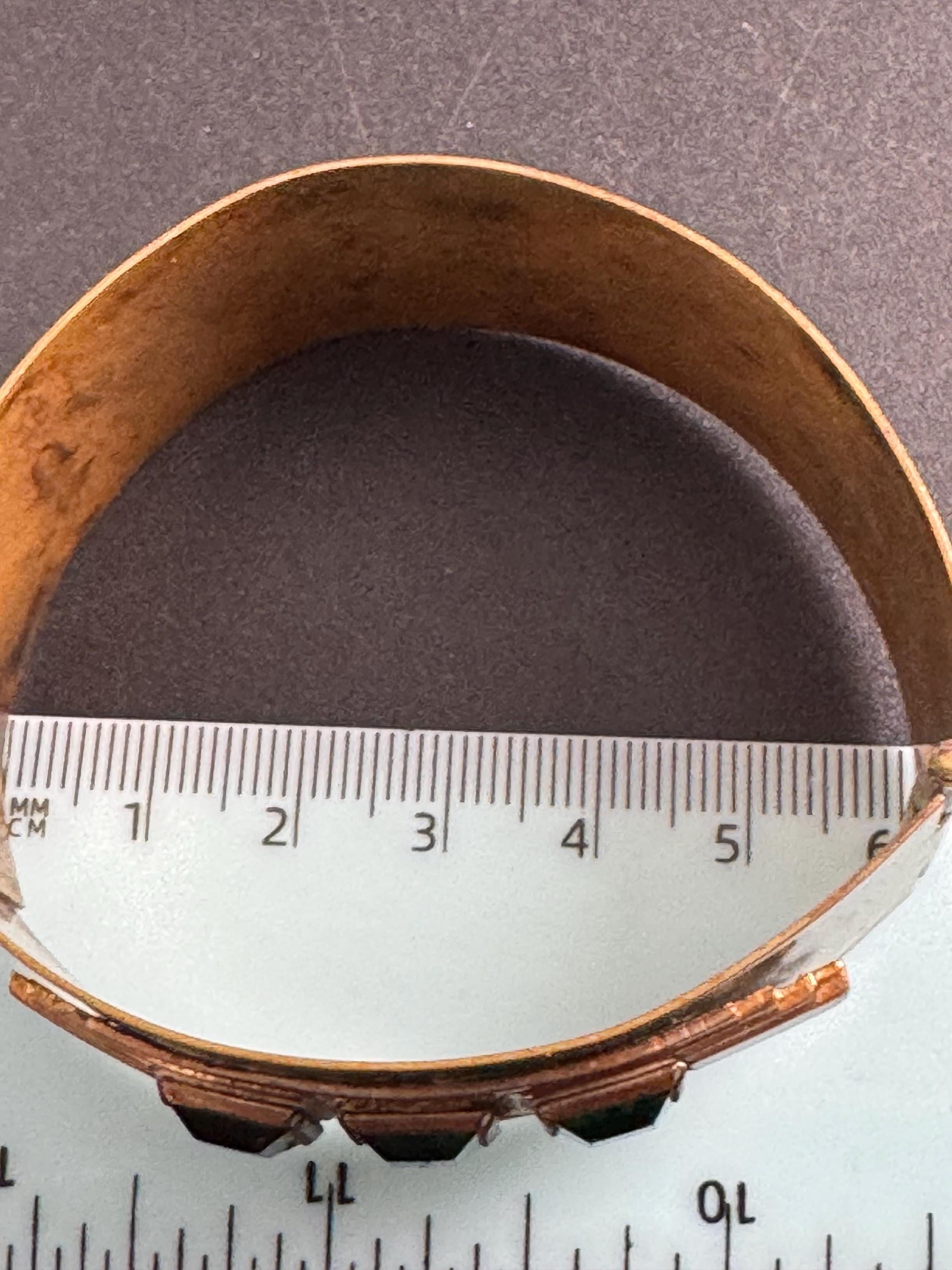 Czech art deco brass clamper Bangle bracelet, set with emerald green rhinestones