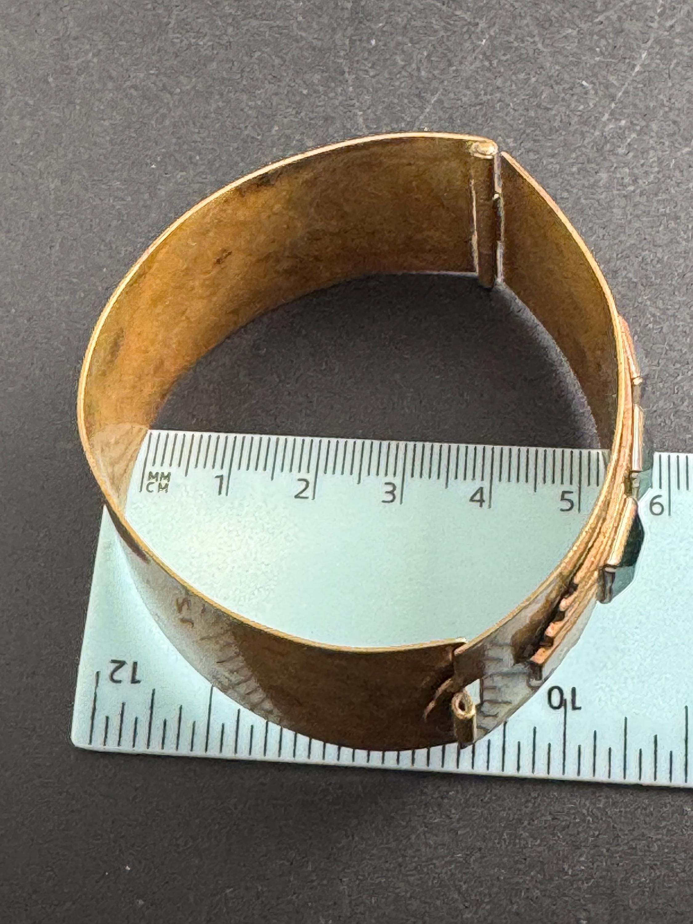 Czech art deco brass clamper Bangle bracelet, set with emerald green rhinestones