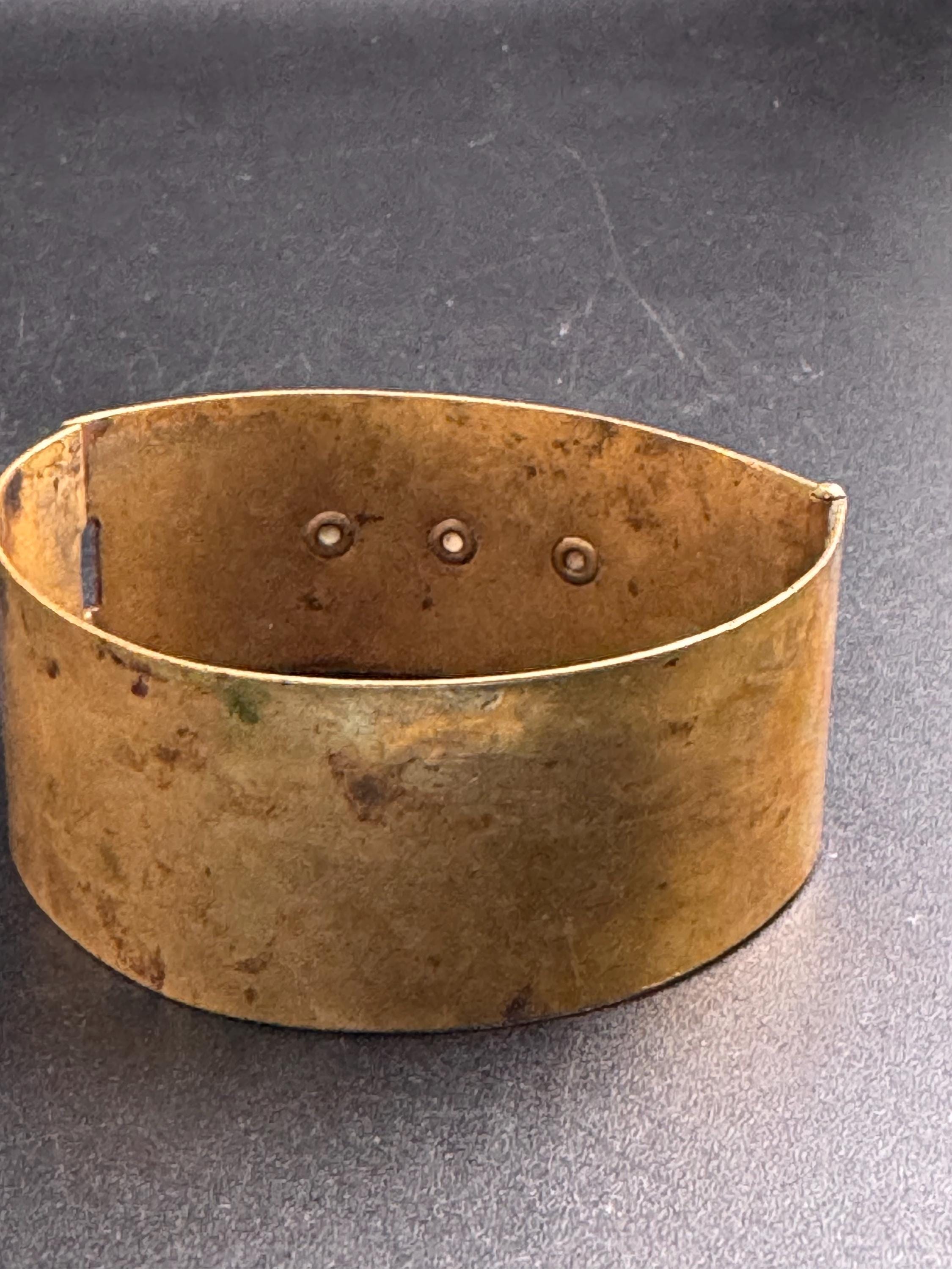 Czech art deco brass clamper Bangle bracelet, set with emerald green rhinestones