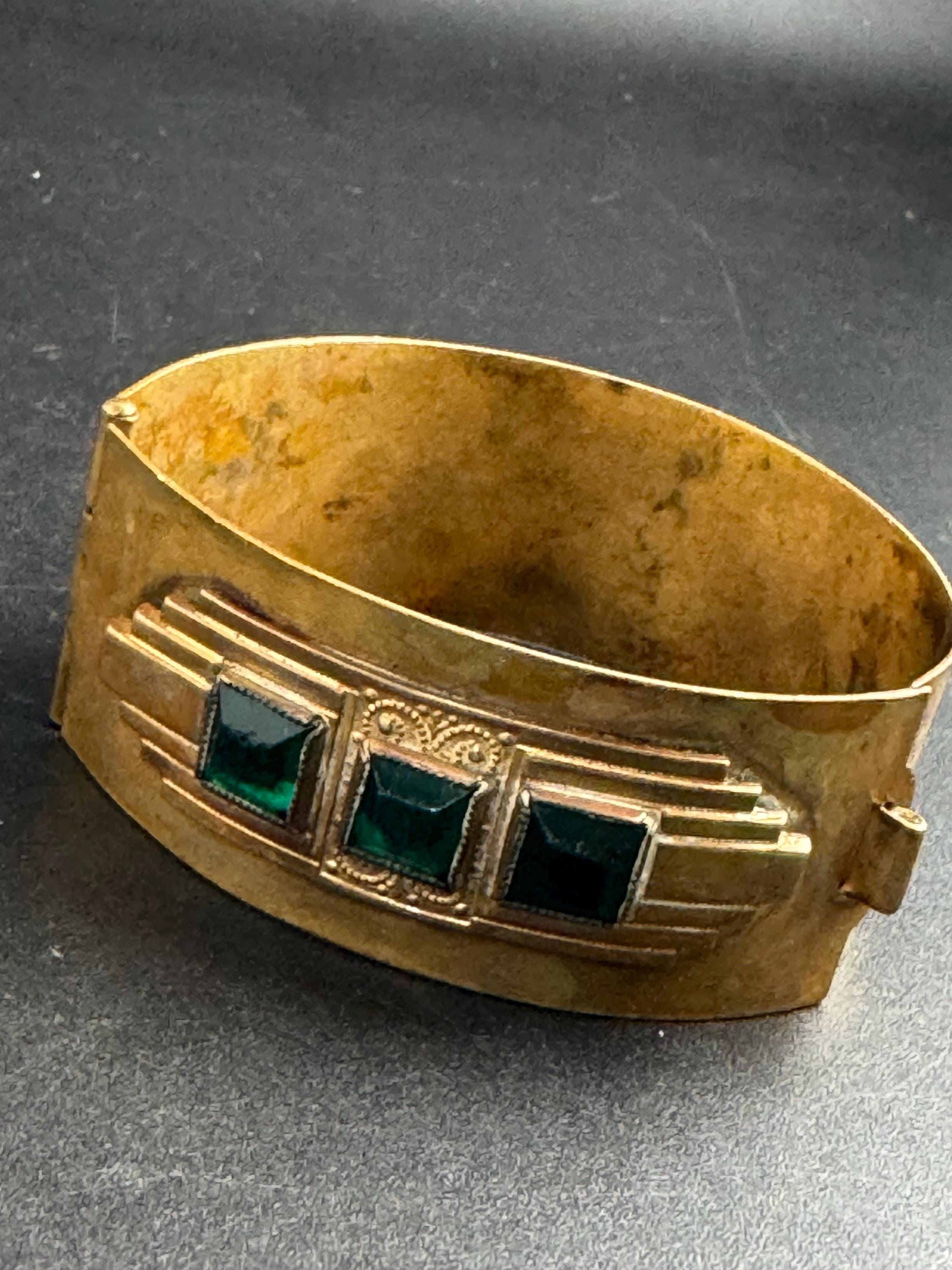Czech art deco brass clamper Bangle bracelet, set with emerald green rhinestones