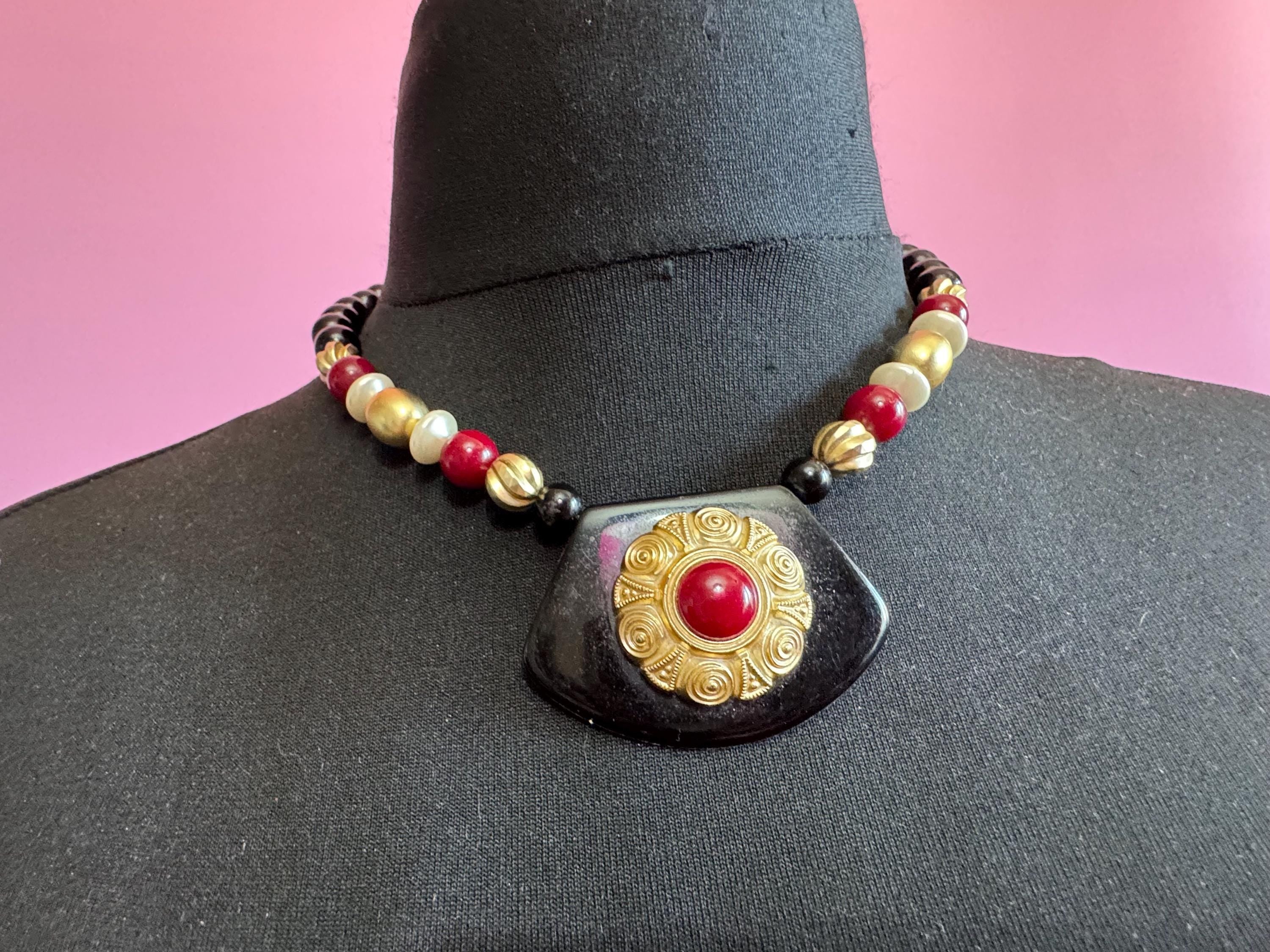 Black beaded statement necklace, red gold acrylic pendant