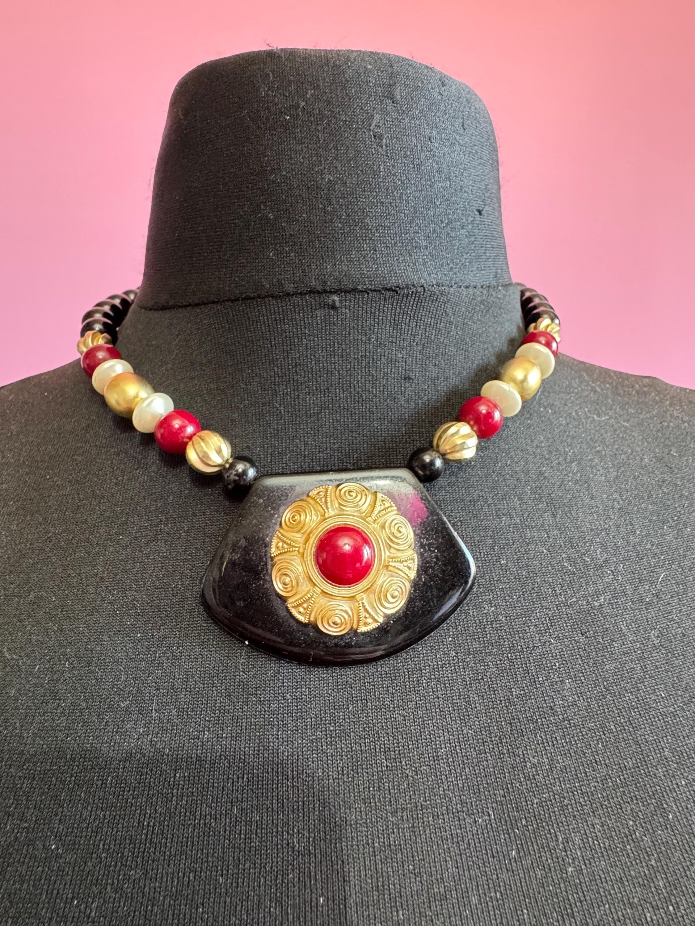 Black beaded statement necklace, red gold acrylic pendant