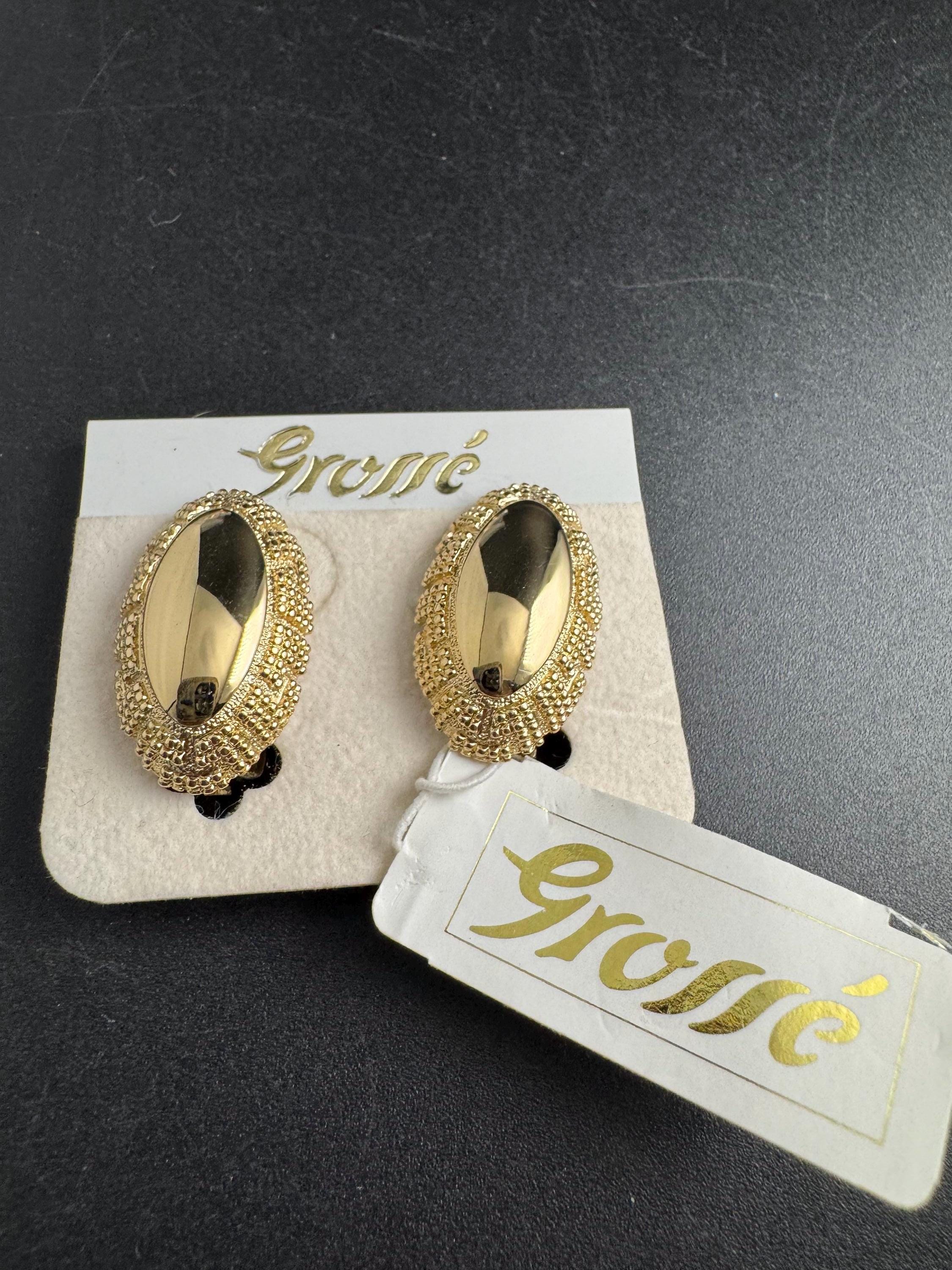Grosse gold plated clip on earrings, unused vintage stock designer and fully signed