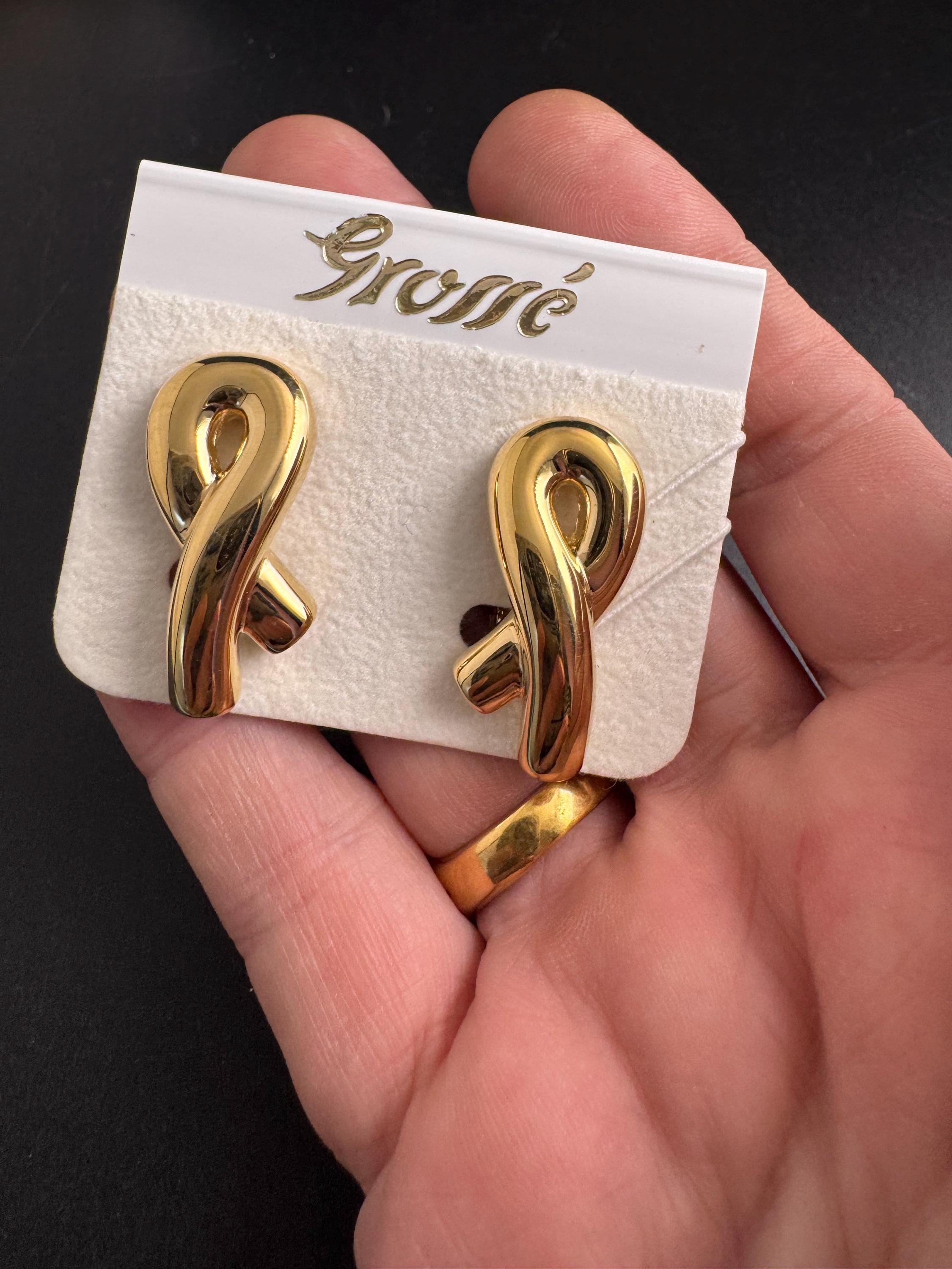 Grosse gold plated clip on earrings, unused vintage stock designer and fully signed