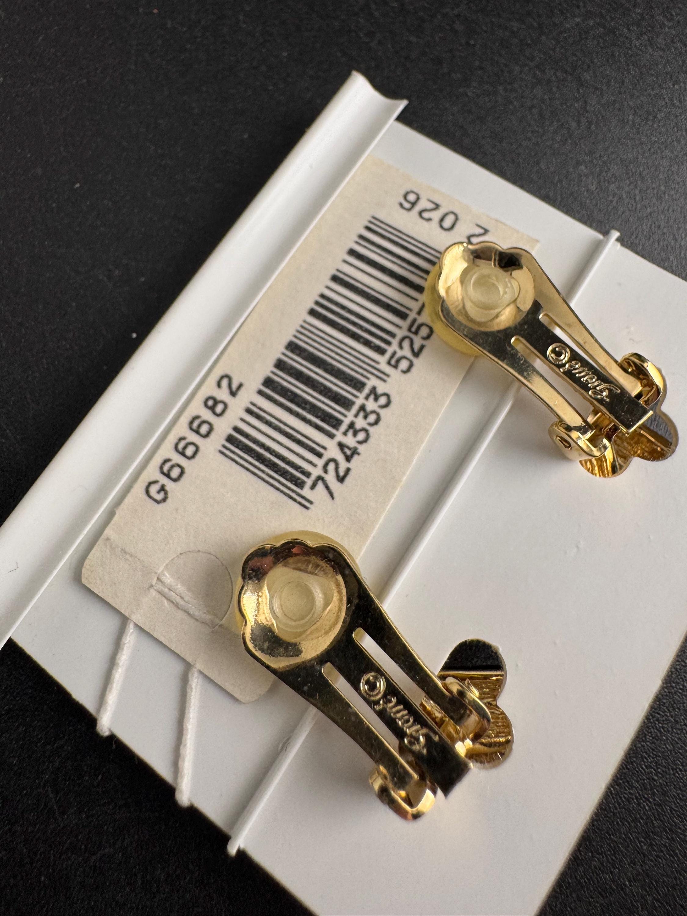 Grosse gold plated clip on earrings, unused vintage stock designer and fully signed