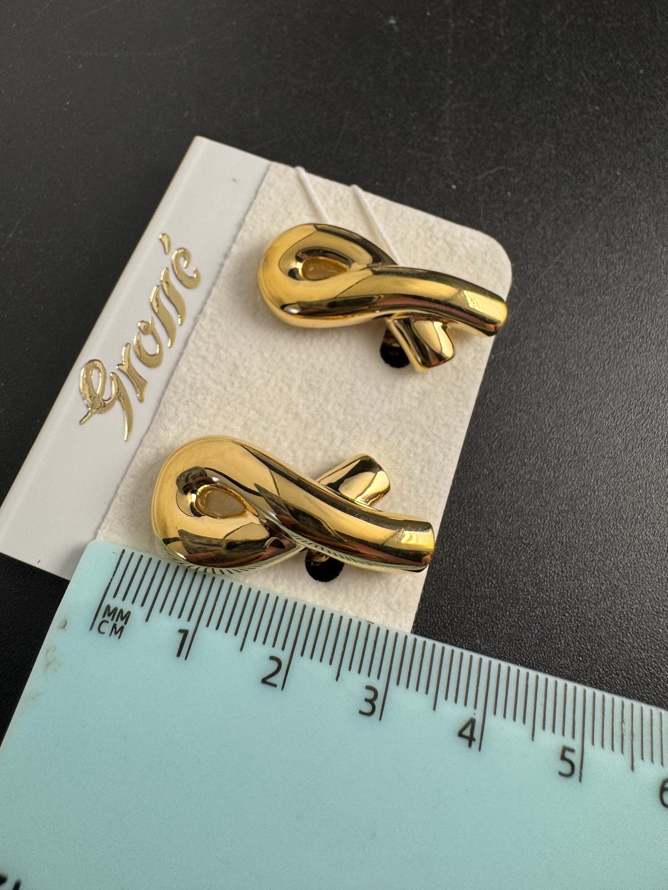 Grosse gold plated clip on earrings, unused vintage stock designer and fully signed