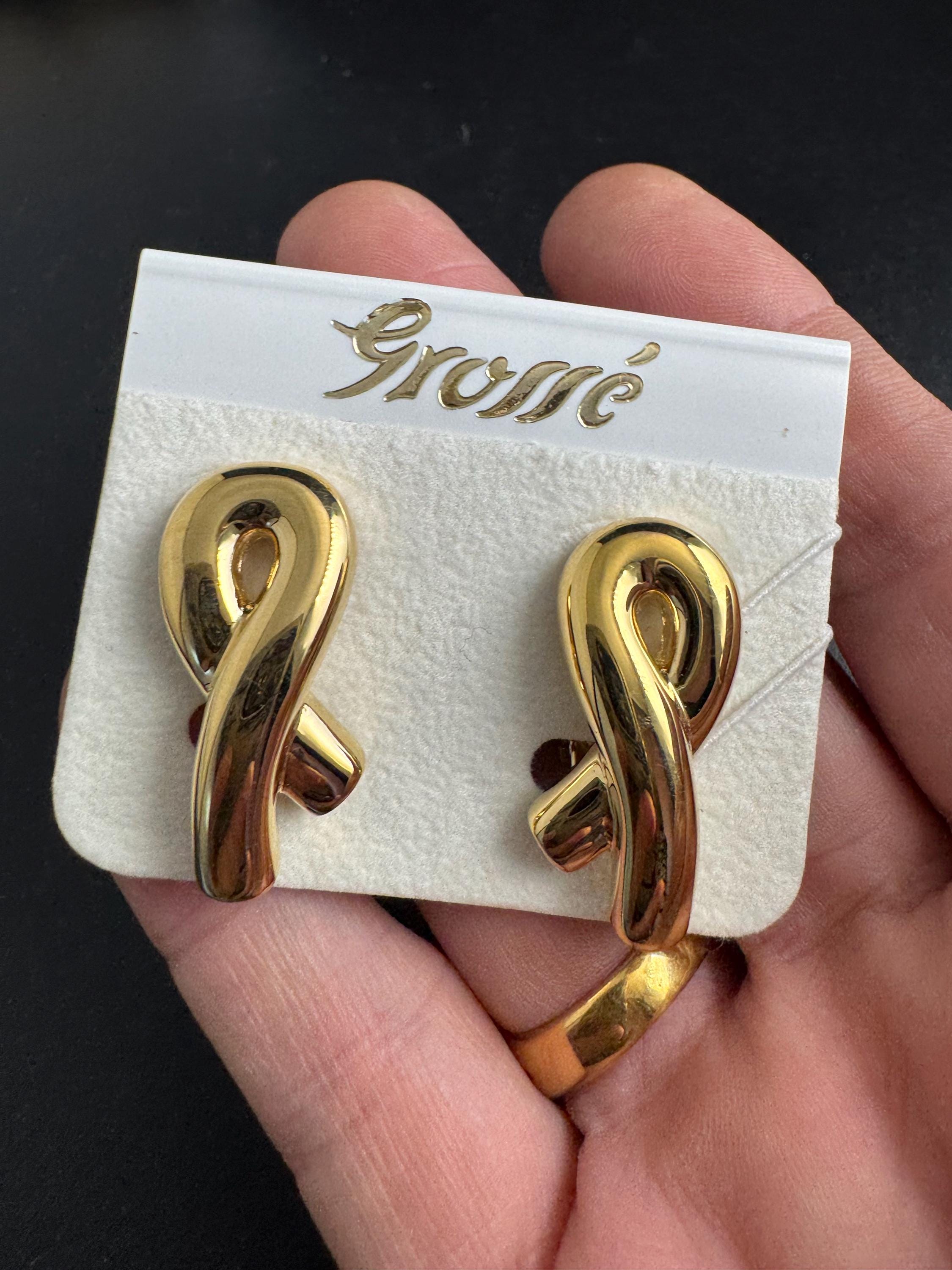Grosse gold plated clip on earrings, unused vintage stock designer and fully signed