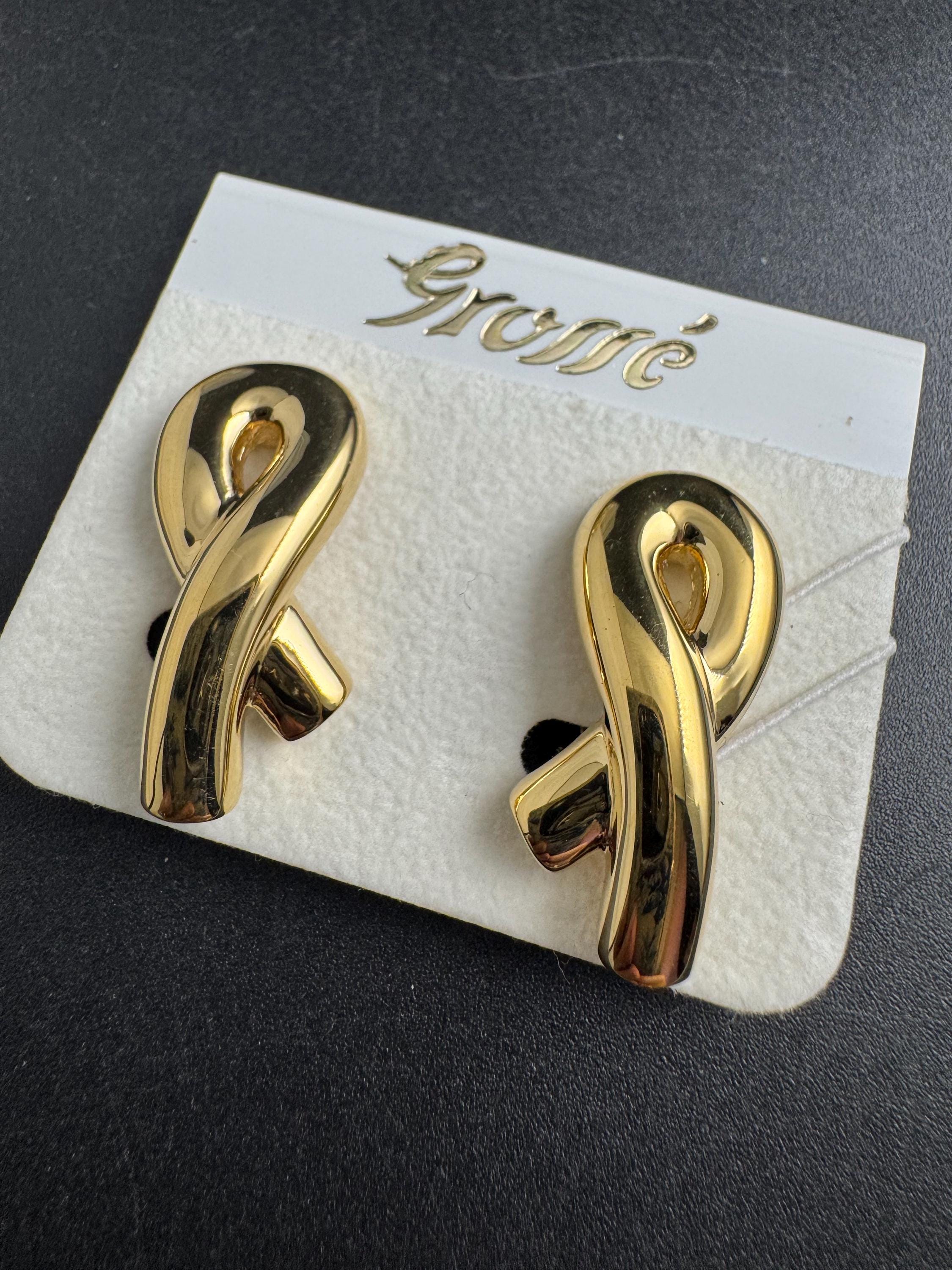 Grosse gold plated clip on earrings, unused vintage stock designer and fully signed