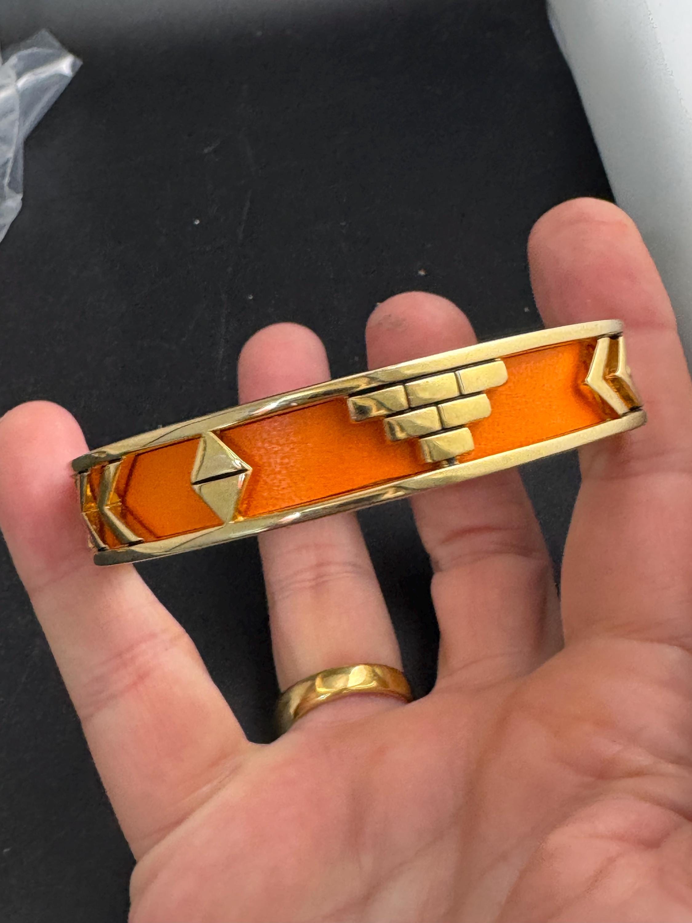 House of Harlow Orange inca bangle, enamelled 1960s gold plated