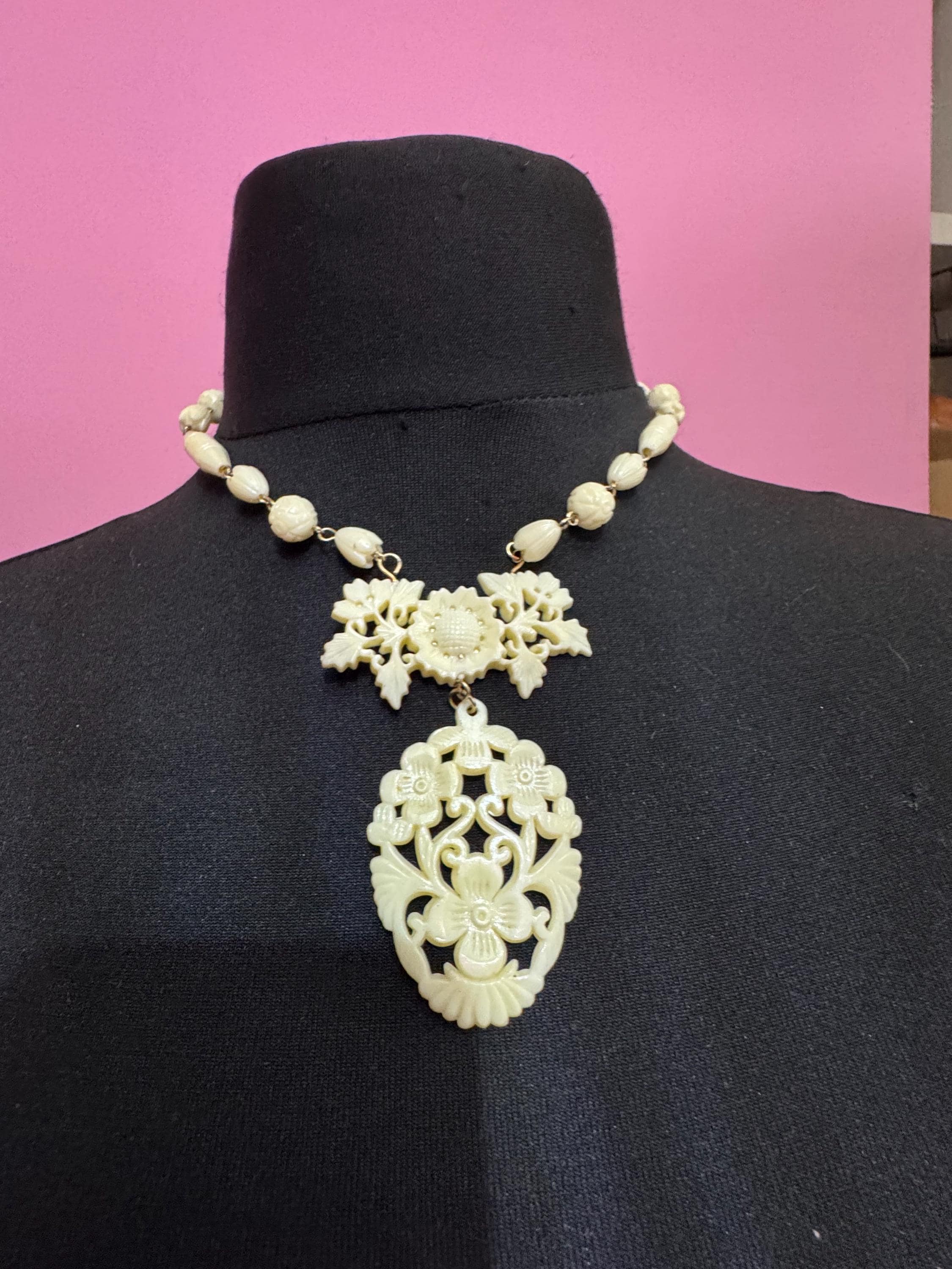 Celluloid openwork Pendant Necklace, early plastic Floral Motif 44cm art deco