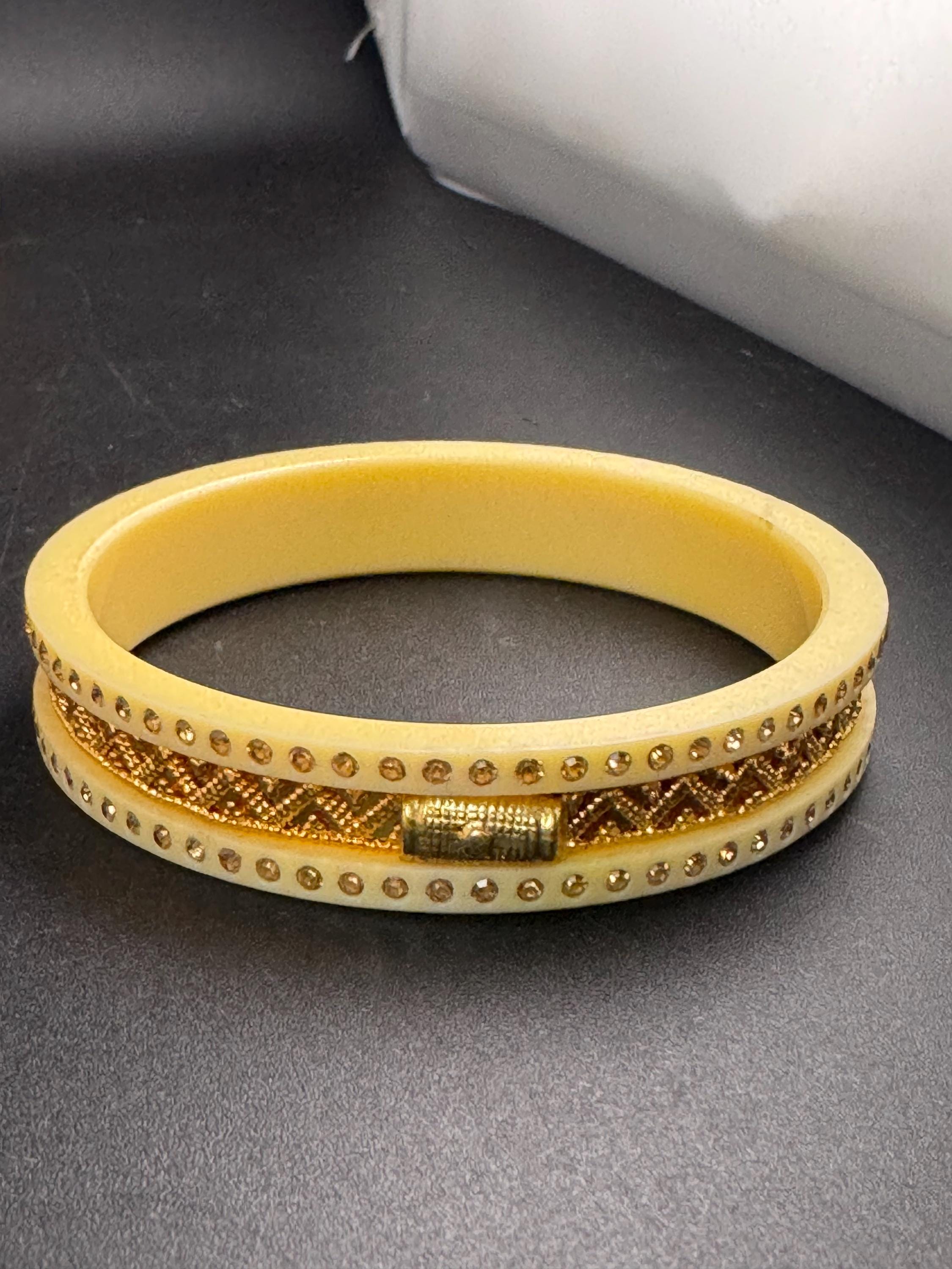 Cream Early Plastic Celluloid bangle bracelet, with gold and rhinestone  detailing