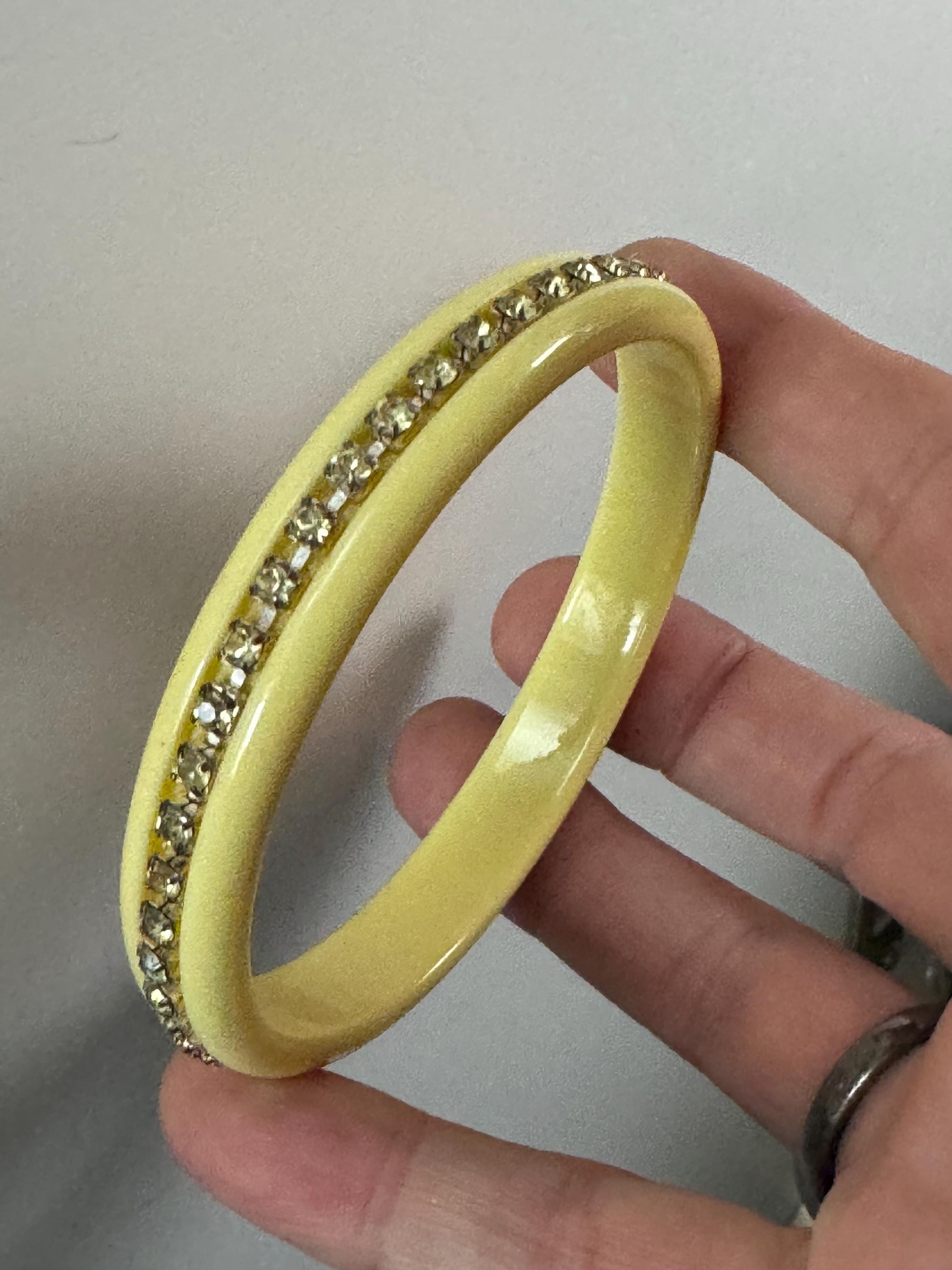 Cream Early Plastic Celluloid bangle bracelet, with channel set rhinestone  detailing