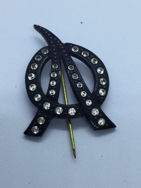True Art Deco flash pin diamante paste rhinestone bakelite hat pin