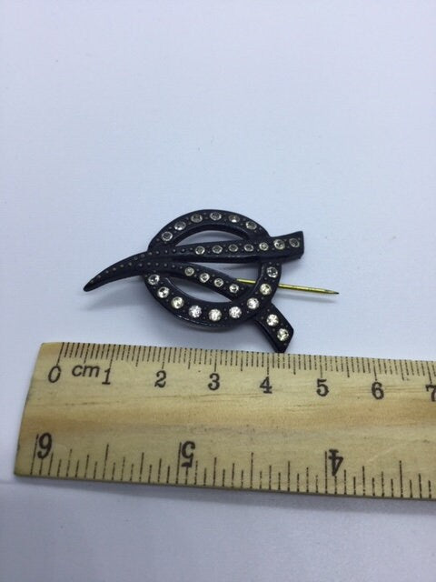 True Art Deco flash pin diamante paste rhinestone bakelite hat pin