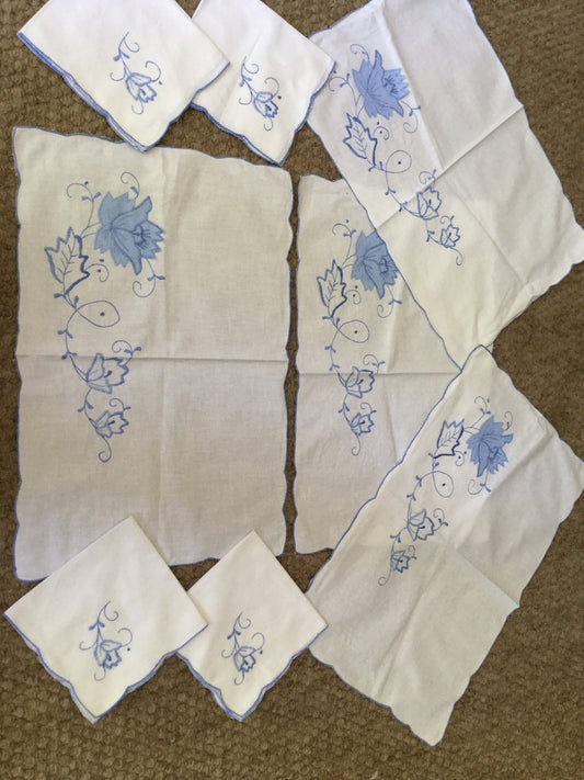 Set of 4 blue embroidery placemats tray cloths and 4 matching napkins