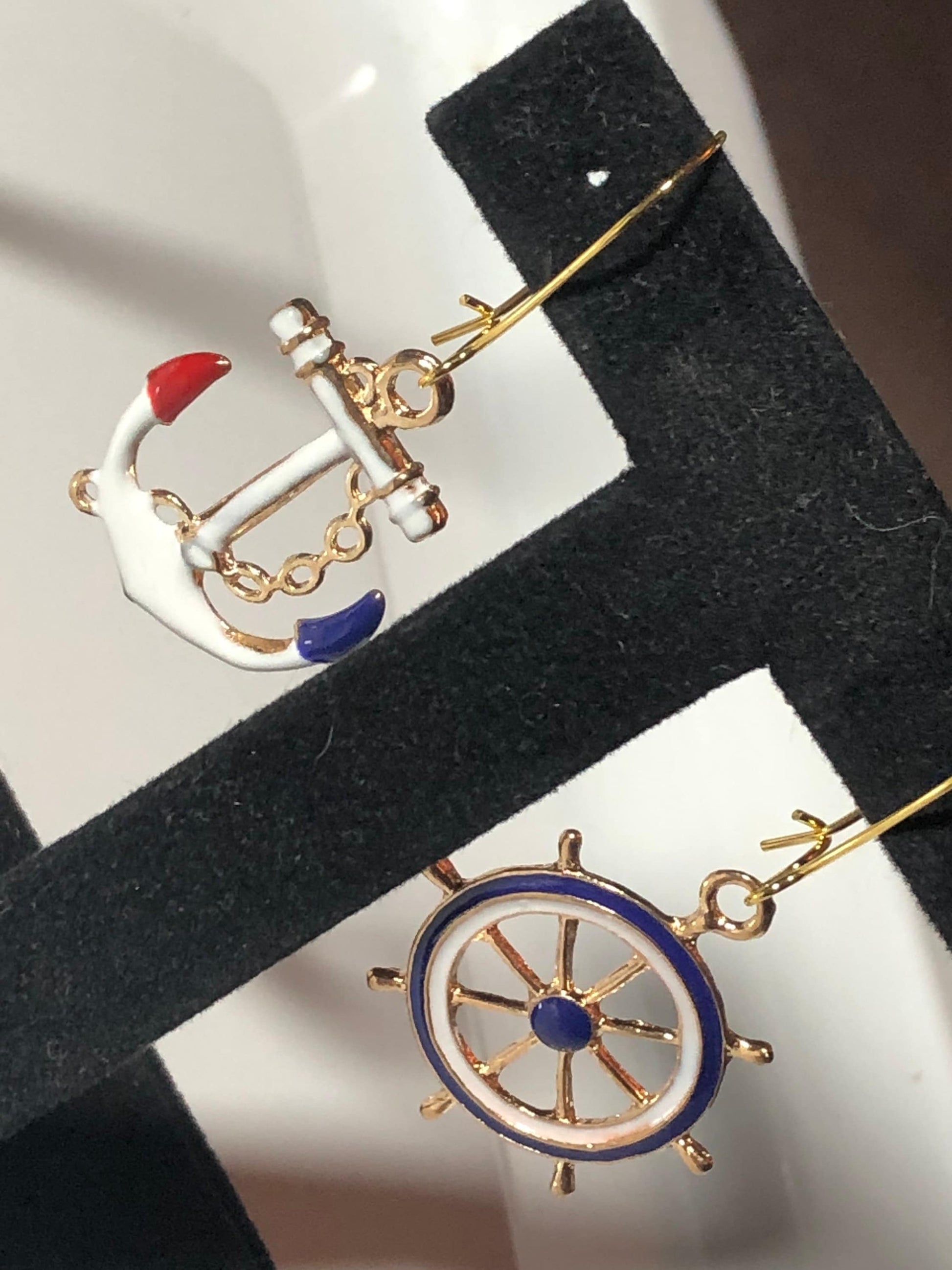 Nautical gold tone white enamel anchor and ships wheel small drop earrings