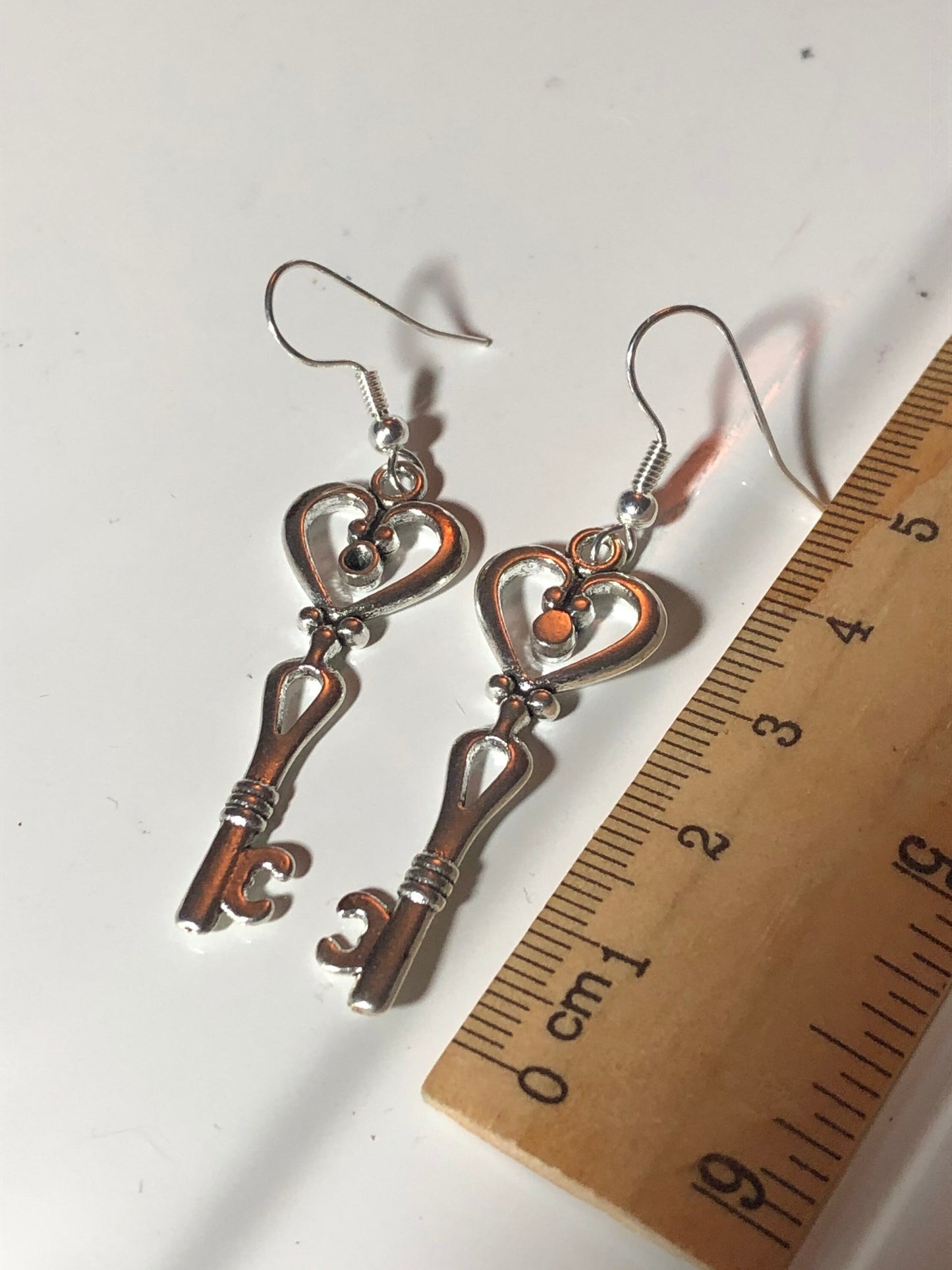 silver tone Victorian style antique key earrings pierced ears
