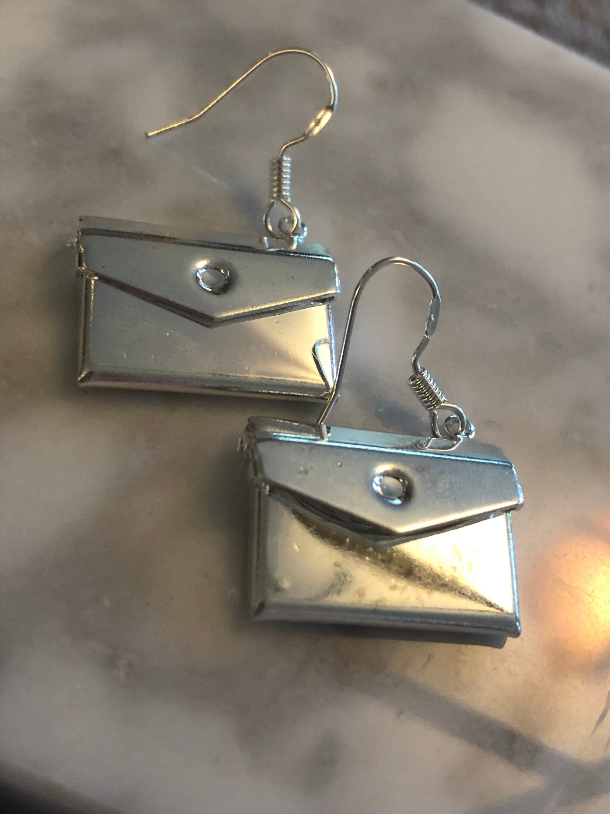 silver tone metal articulated opening envelope drop earrings for pierced ears