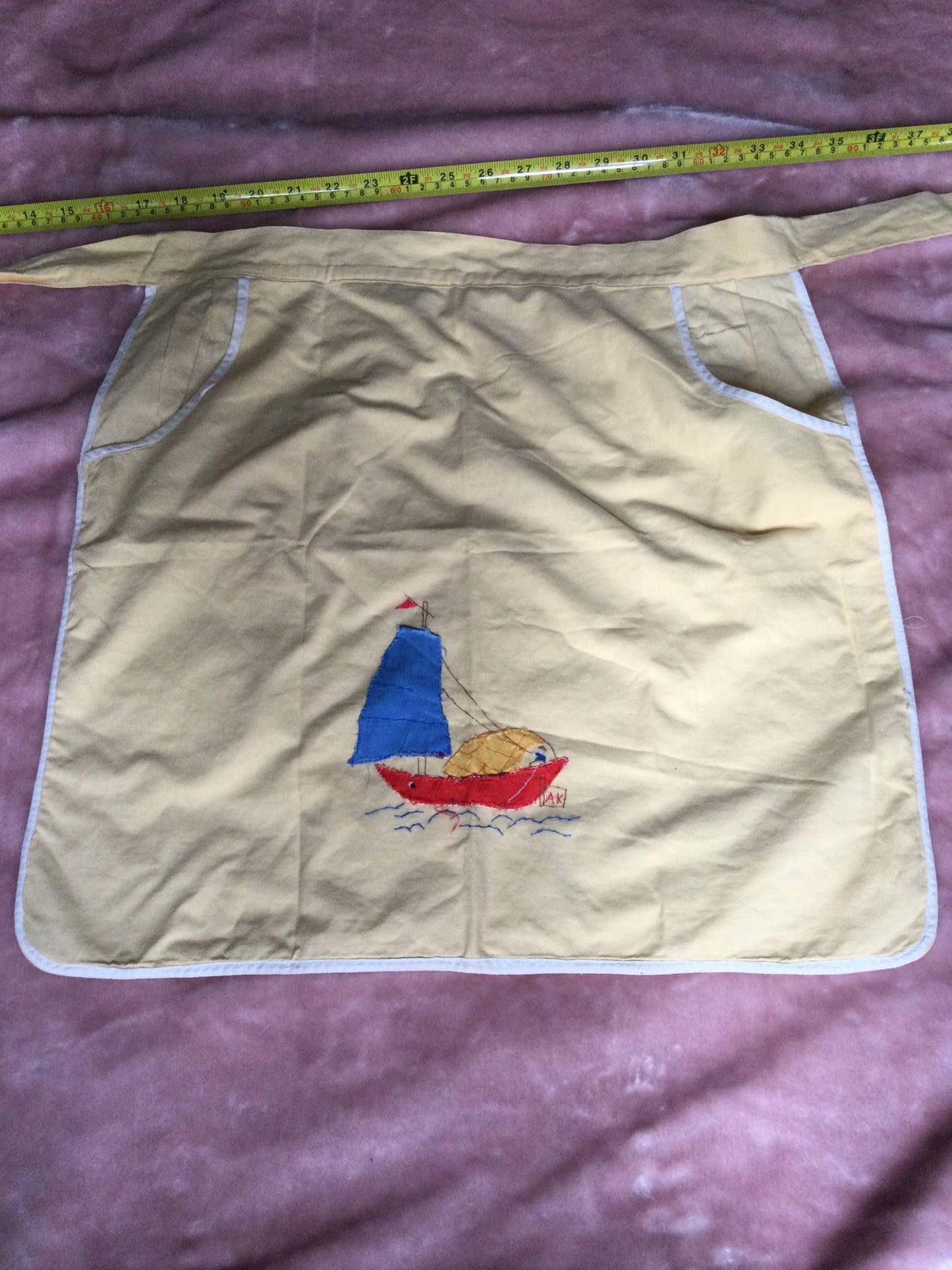 Vintage cotton half pinny apron lemon yellow appliqué Chinese fishing boat design