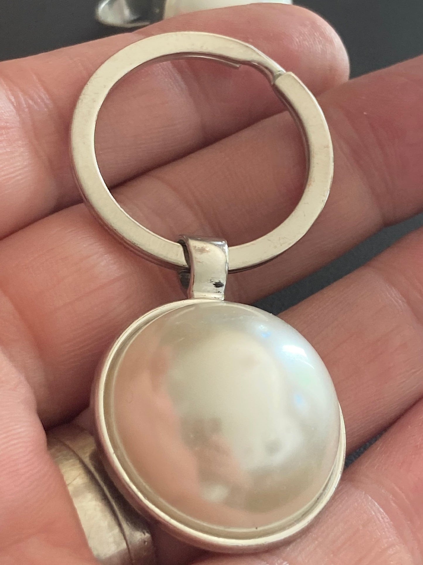 Designer style white faux Pearl silver tone keyring with 25mm plastic domed Pearl cabochon