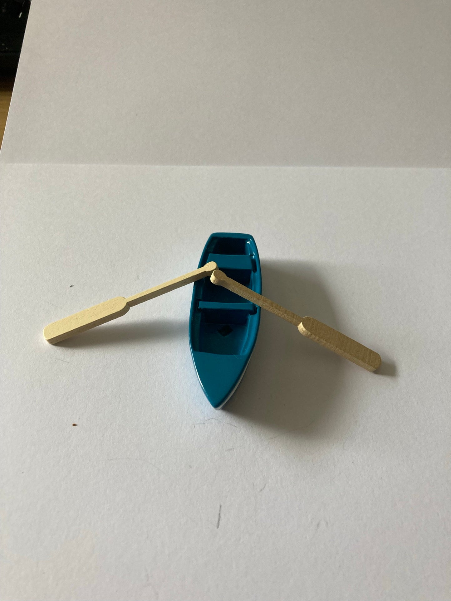6-7cm miniature blue sea rowing boat and 2 oars seaside cake topper decoration