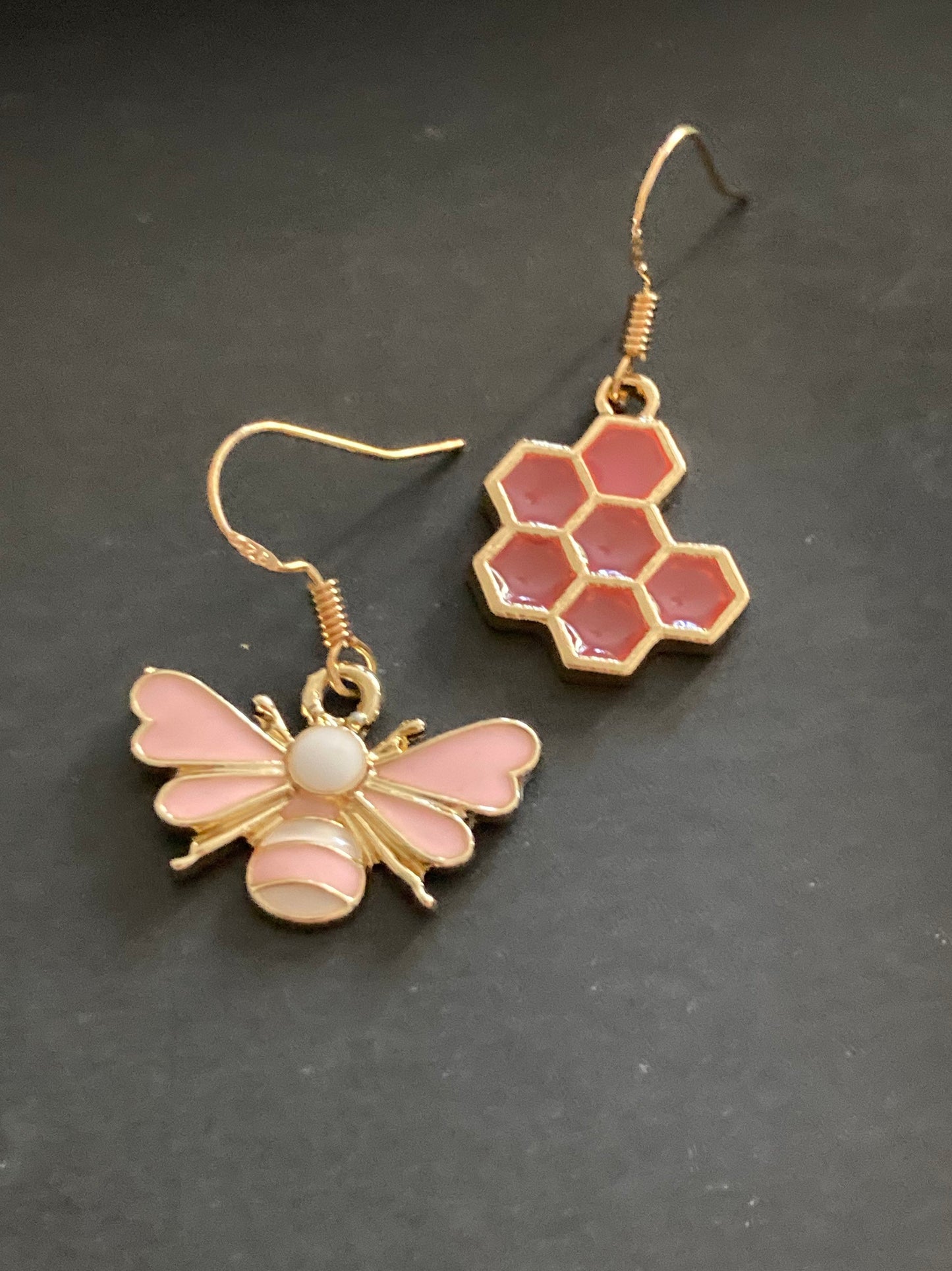 Gold tone pink bumble bee and pink honeycomb drop earrings