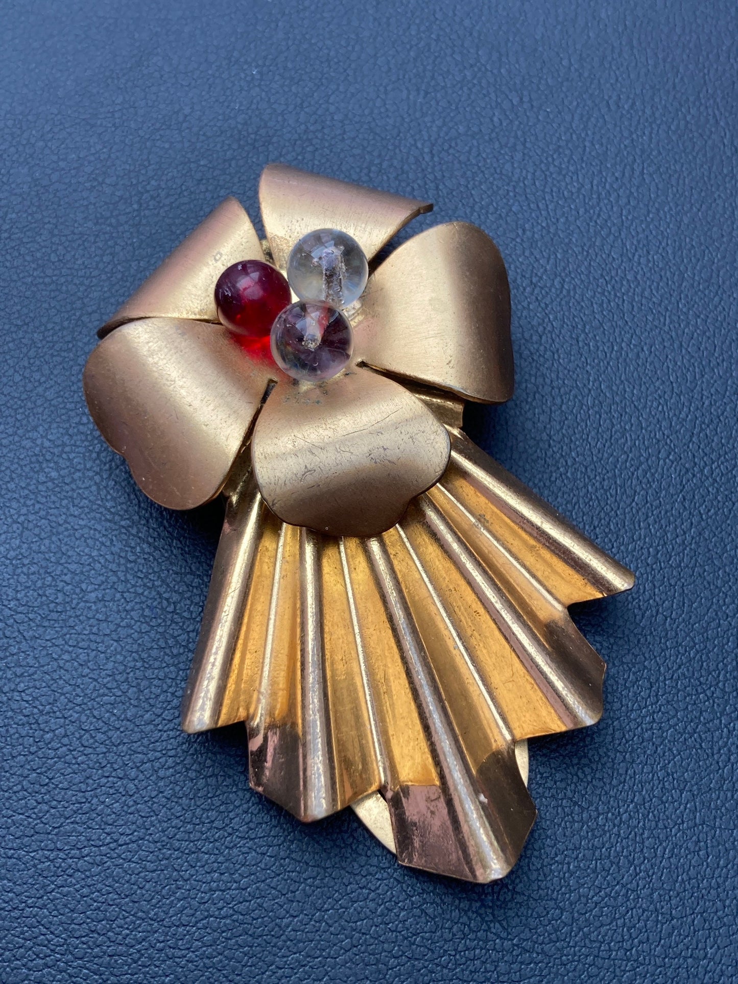 Art Deco Brass fluted Dress Clip with red clear glass cabochons