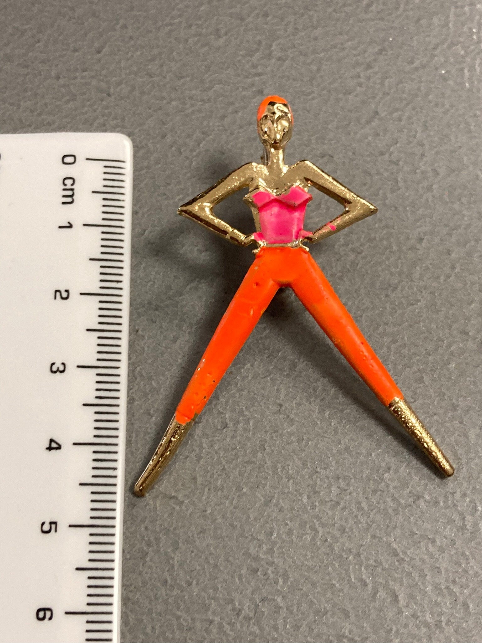 Kitsch 1980s Fitness Yoga luminous painted pink orange lady exercising brooch gold tone