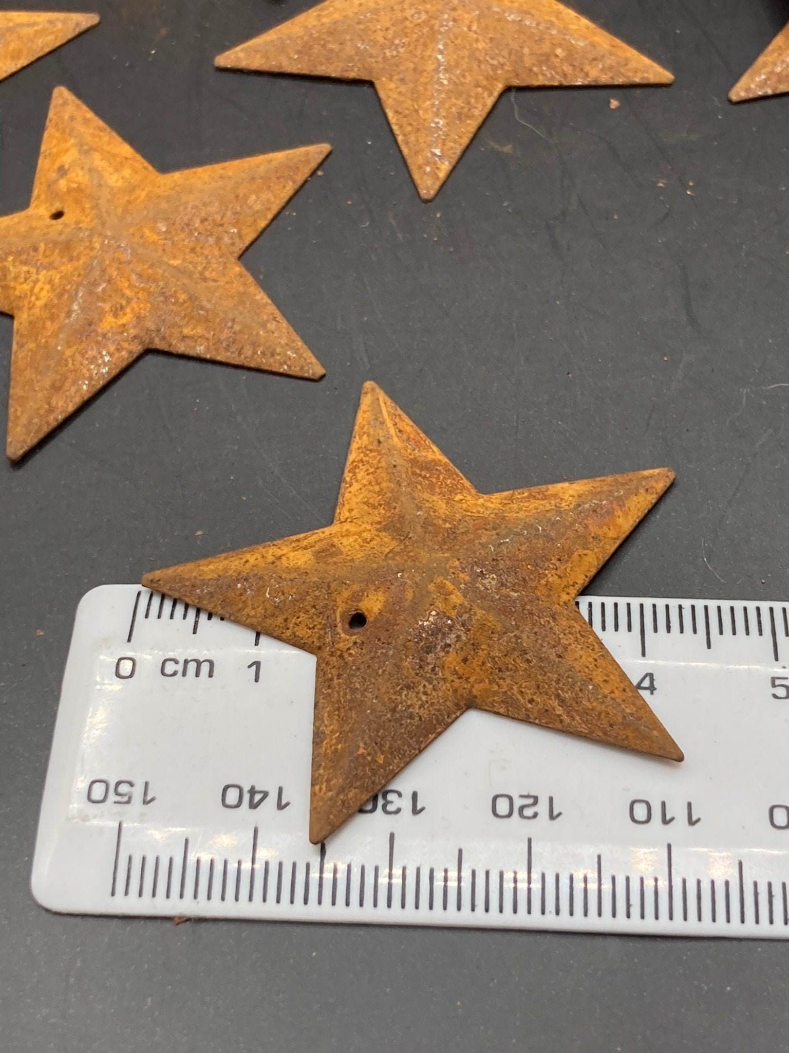 Set of 10 x 4.5cm rusty metal rustic embossed pressed metal STARS craft