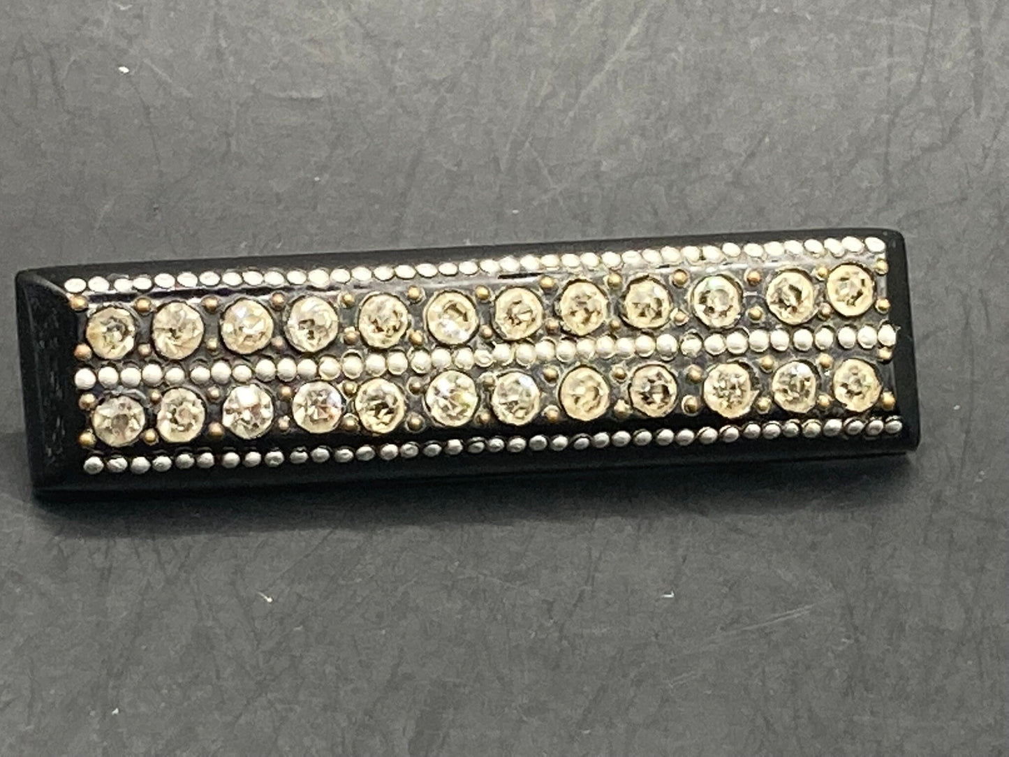 black plastic or Bakelite rhinestone paste diamanté bar brooch