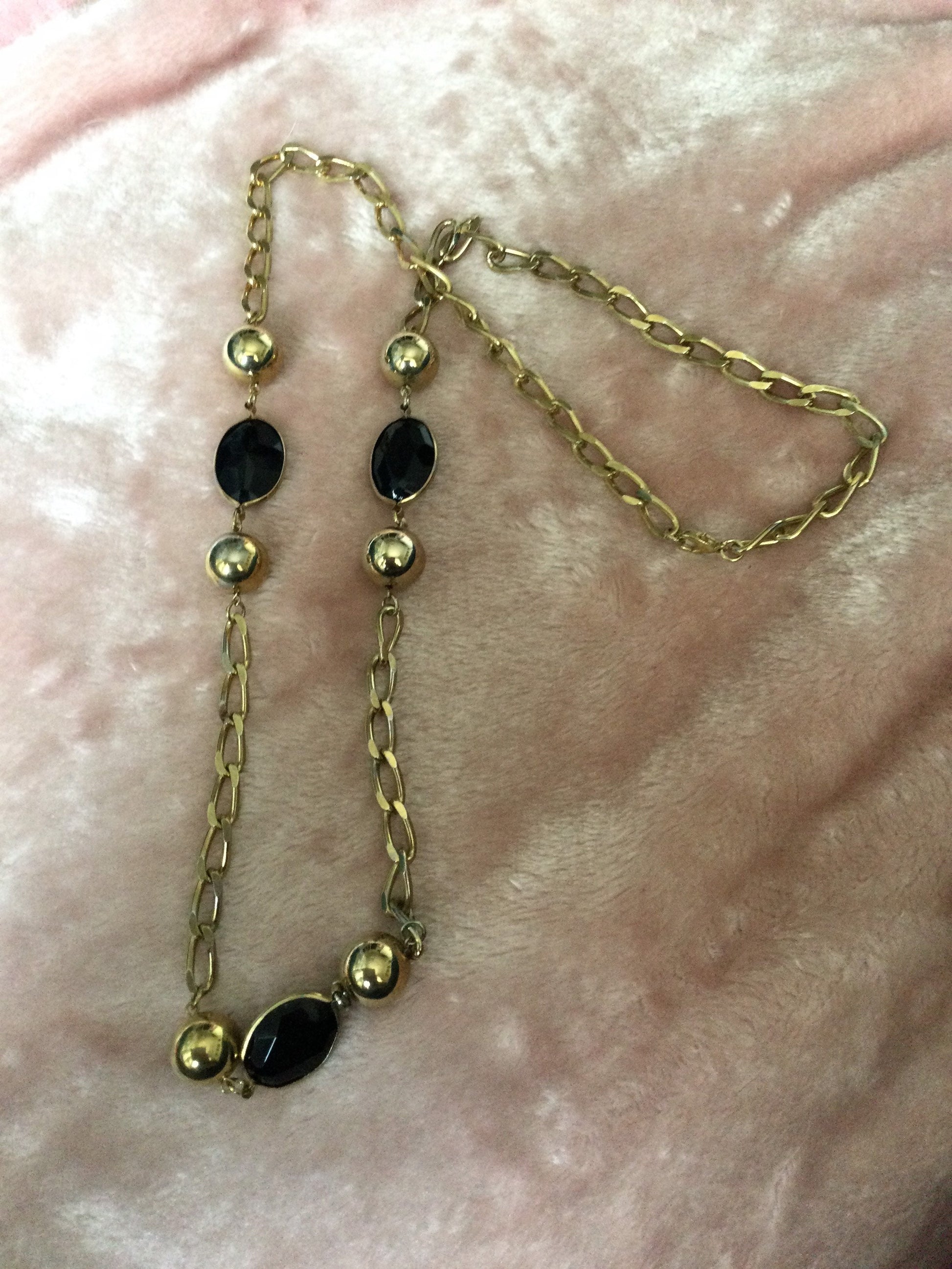 Rivière bezel set clear and black plastic ball link gold tone station necklace